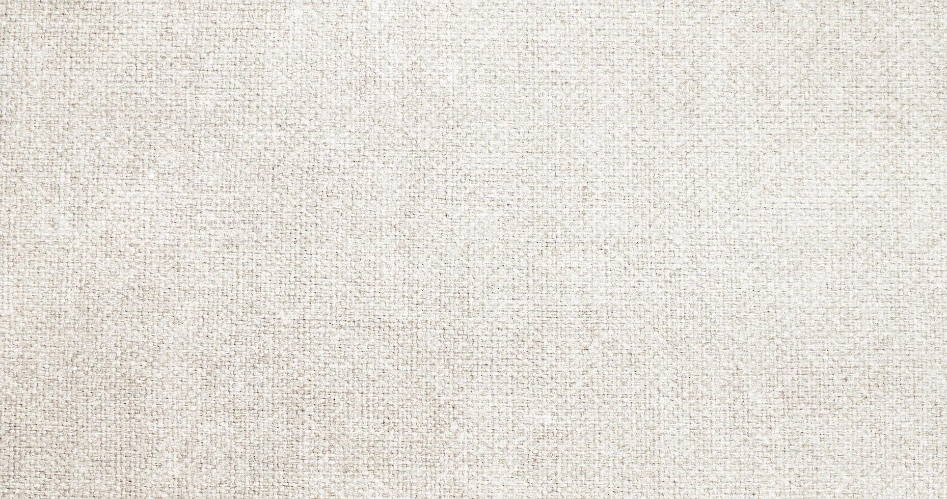 Natural Linen Material Textile Canvas Fabric Texture Background Close-up Detail of Fabric Natural Color Hemp Material Pattern Design Wallpaper. Can be Used as Background or For Graphic Design photo