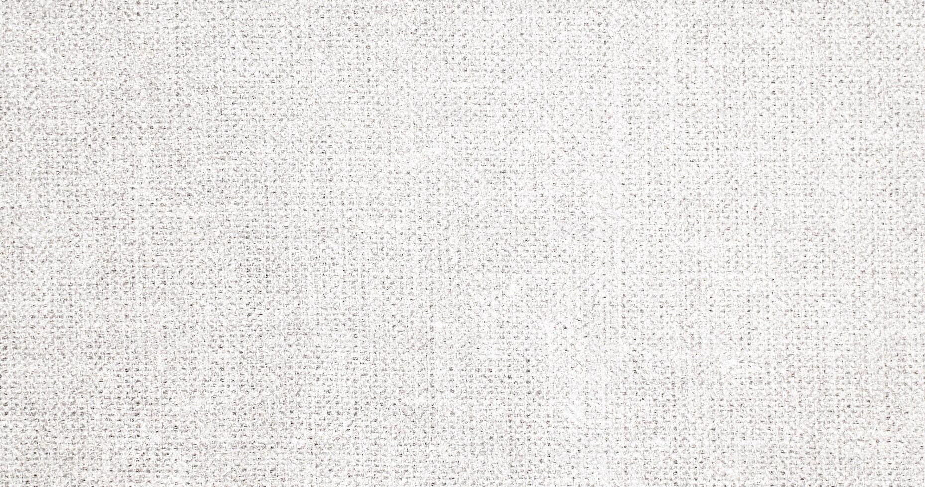 Natural Linen Material Textile Canvas Fabric Texture Background Close-up Detail of Fabric Natural Color Hemp Material Pattern Design Wallpaper. Can be Used as Background or For Graphic Design photo