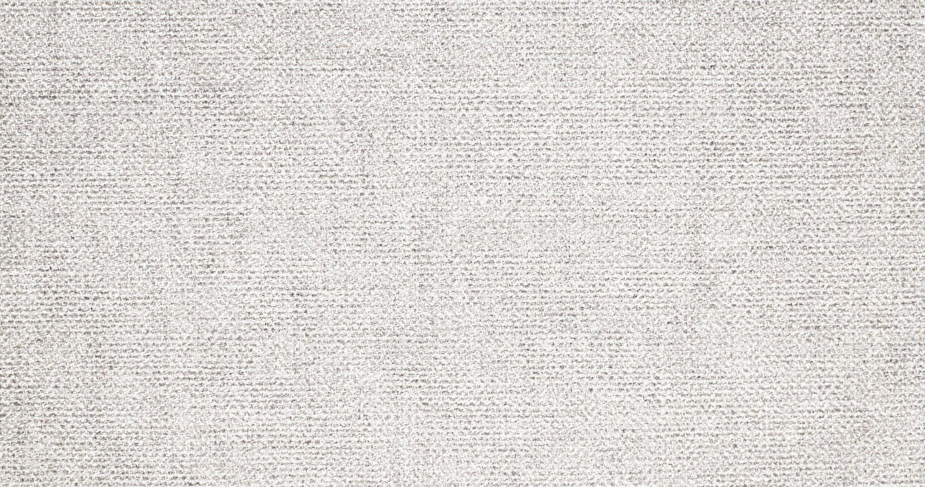 Natural Linen Material Textile Canvas Fabric Texture Background Close-up Detail of Fabric Natural Color Hemp Material Pattern Design Wallpaper. Can be Used as Background or For Graphic Design photo