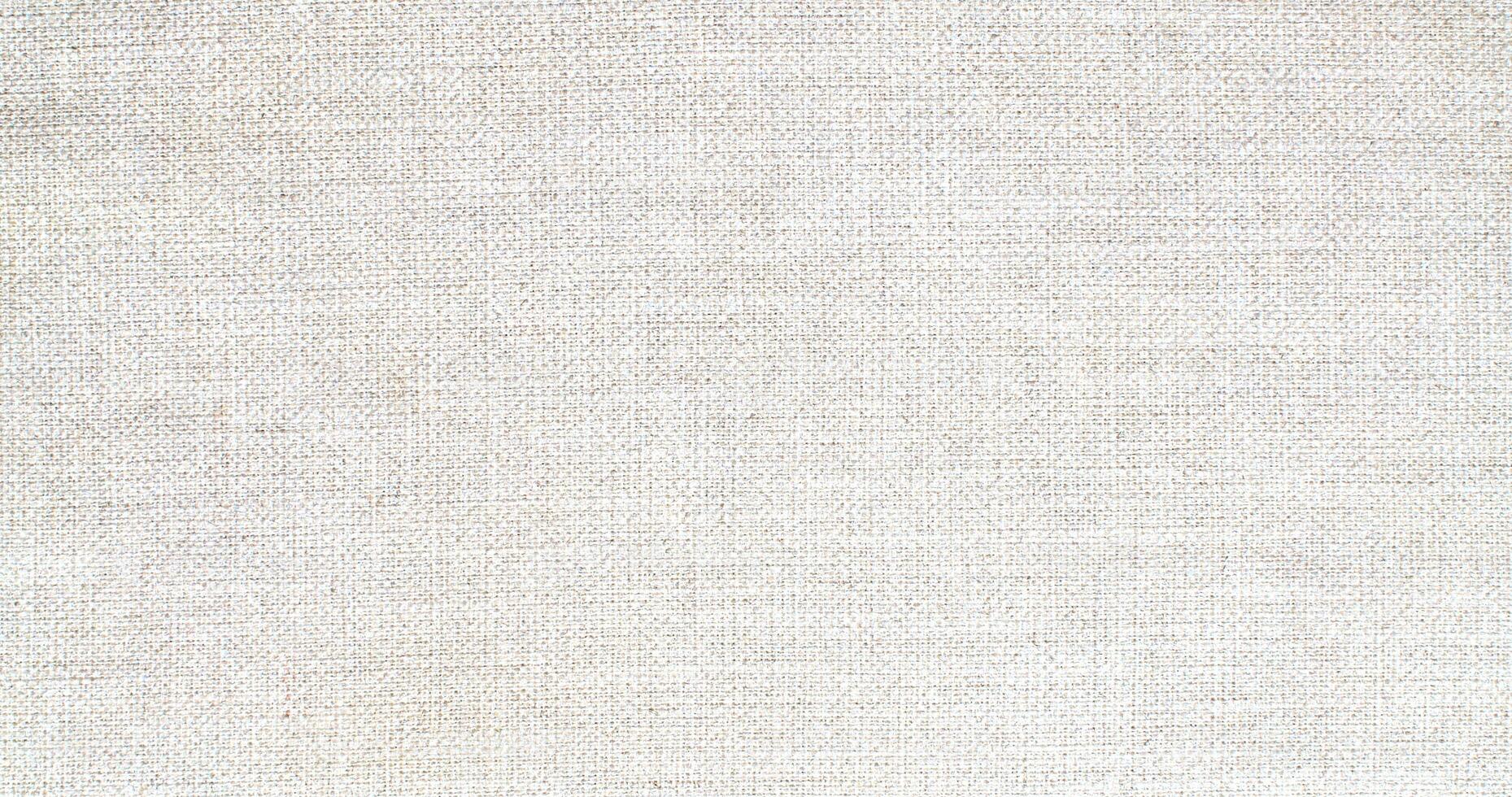 Natural Linen Material Textile Canvas Fabric Texture Background Close-up Detail of Fabric Natural Color Hemp Material Pattern Design Wallpaper. Can be Used as Background or For Graphic Design photo