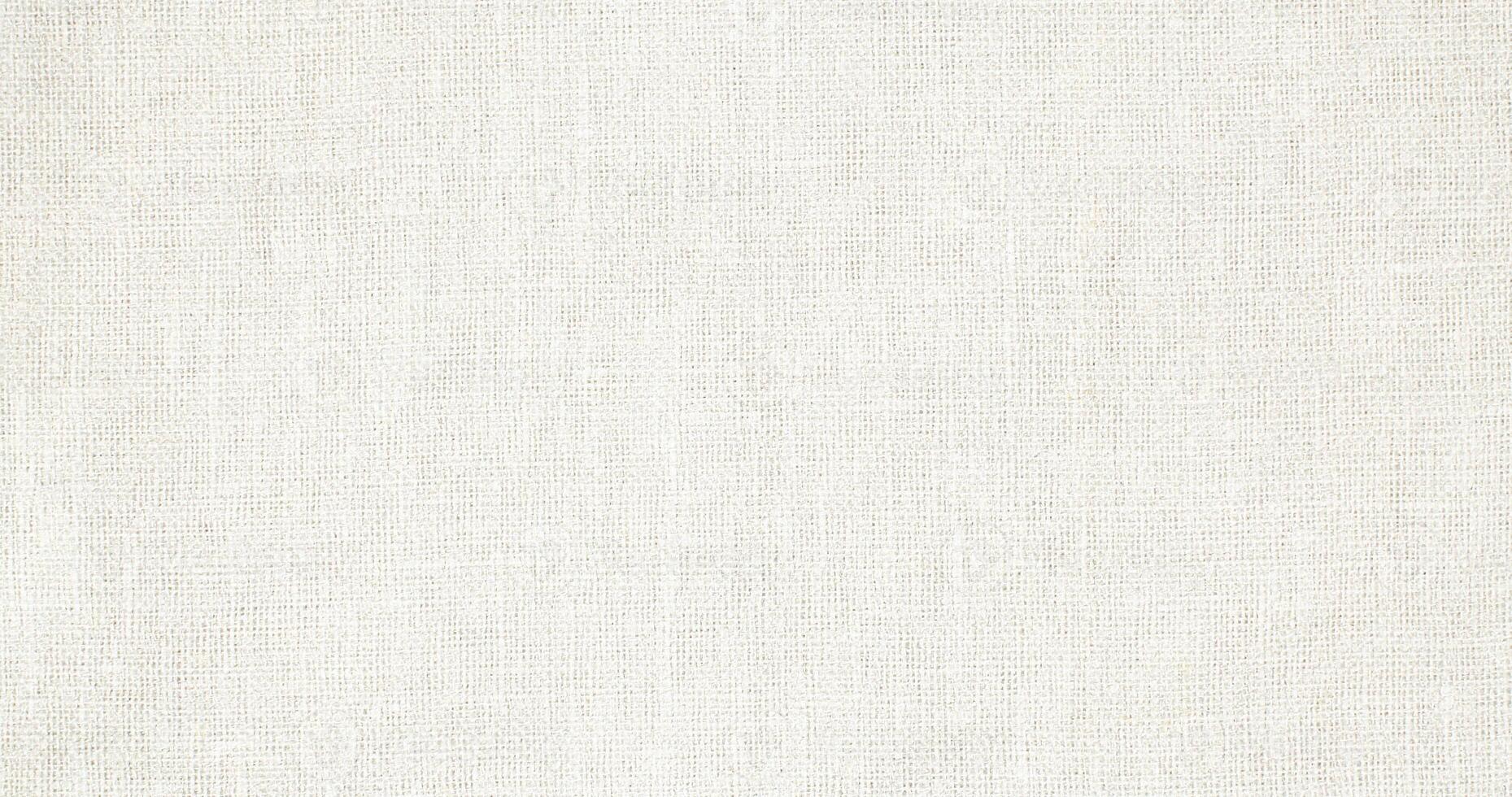 Natural Linen Material Textile Canvas Fabric Texture Background Close-up Detail of Fabric Natural Color Hemp Material Pattern Design Wallpaper. Can be Used as Background or For Graphic Design photo