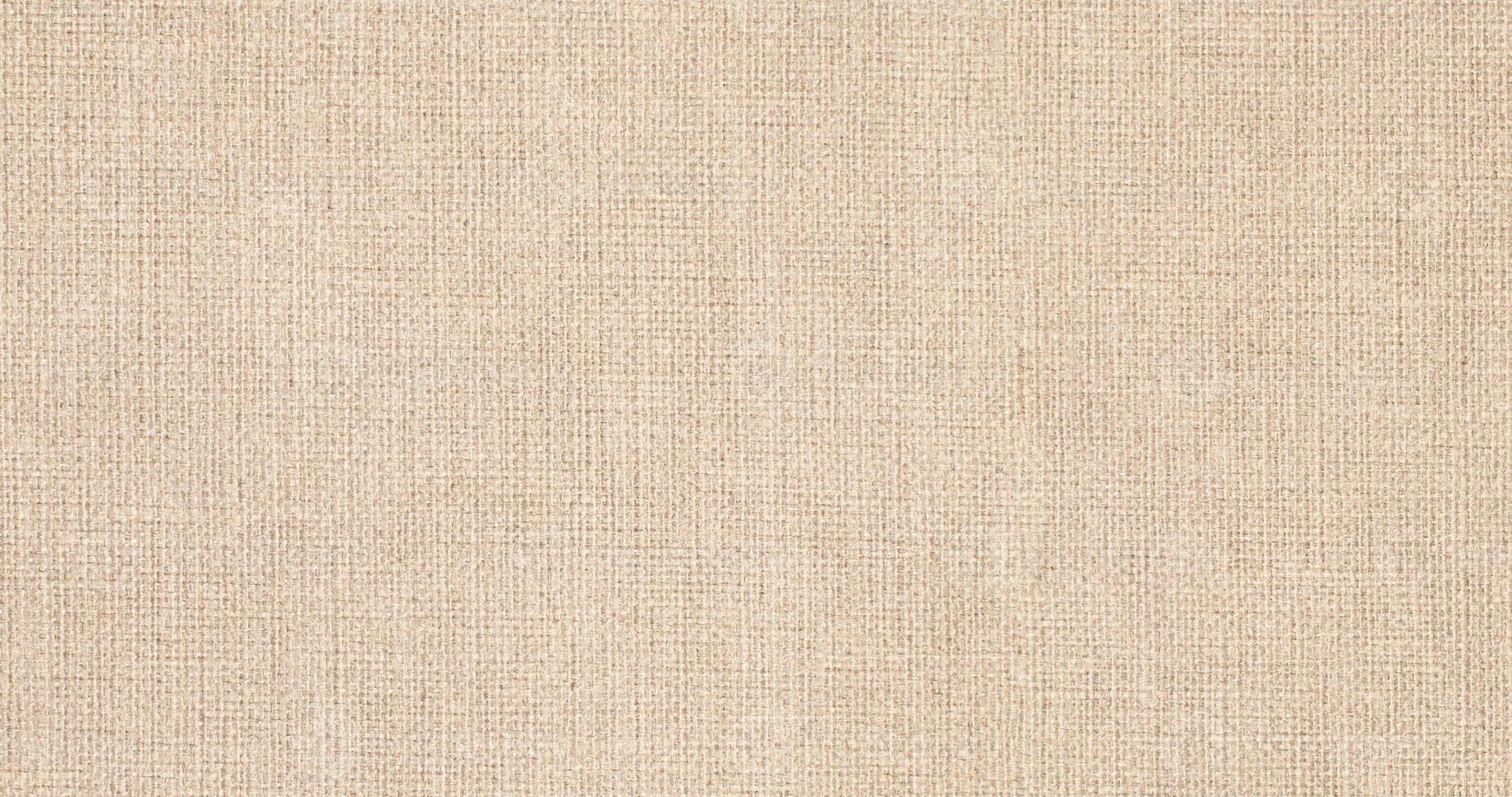 Natural Linen Material Textile Canvas Fabric Texture Background Close-up Detail of Fabric Natural Color Hemp Material Pattern Design Wallpaper. Can be Used as Background or For Graphic Design photo