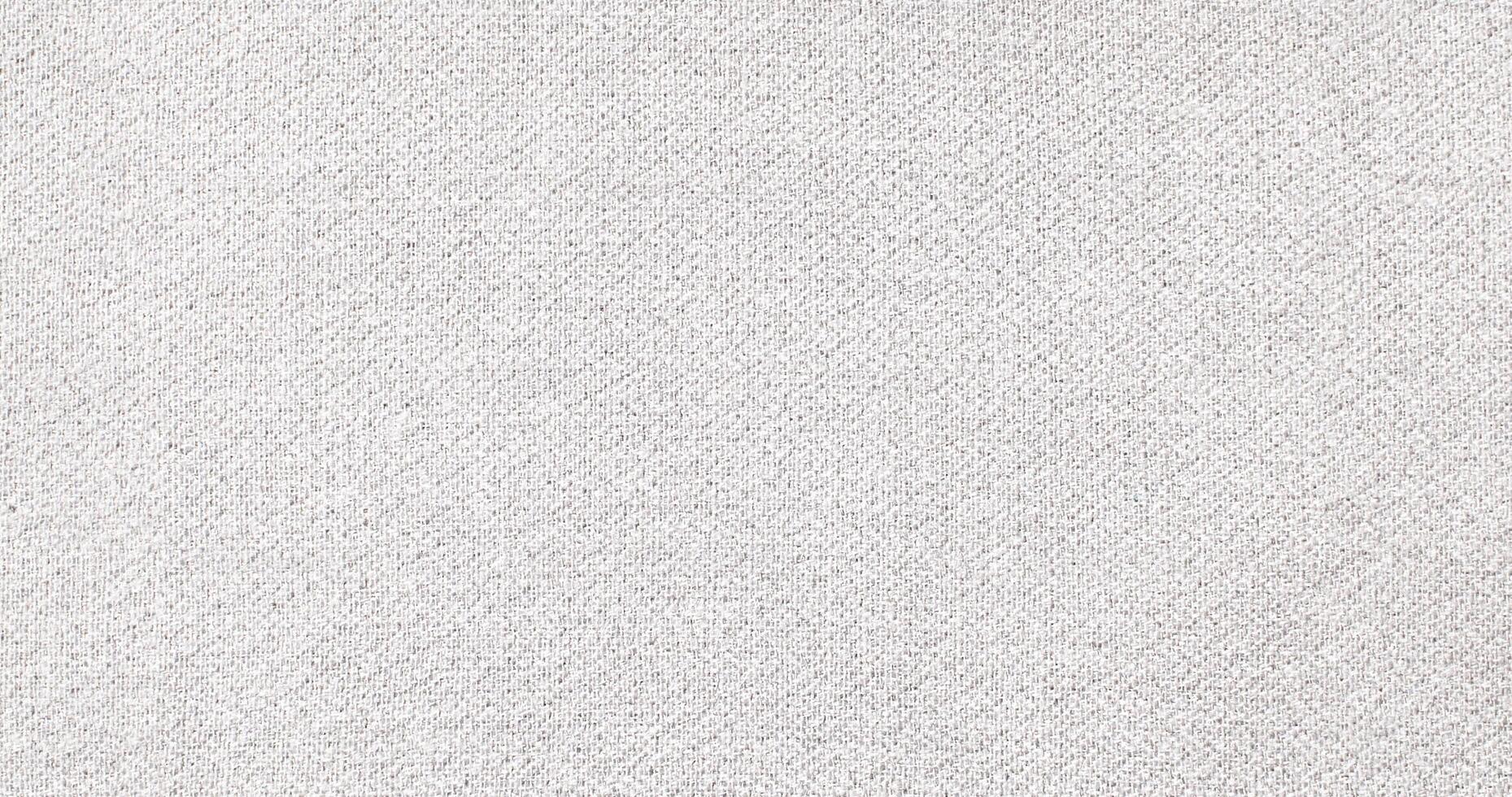 Natural Linen Material Textile Canvas Fabric Texture Background Close-up Detail of Fabric Natural Color Hemp Material Pattern Design Wallpaper. Can be Used as Background or For Graphic Design photo