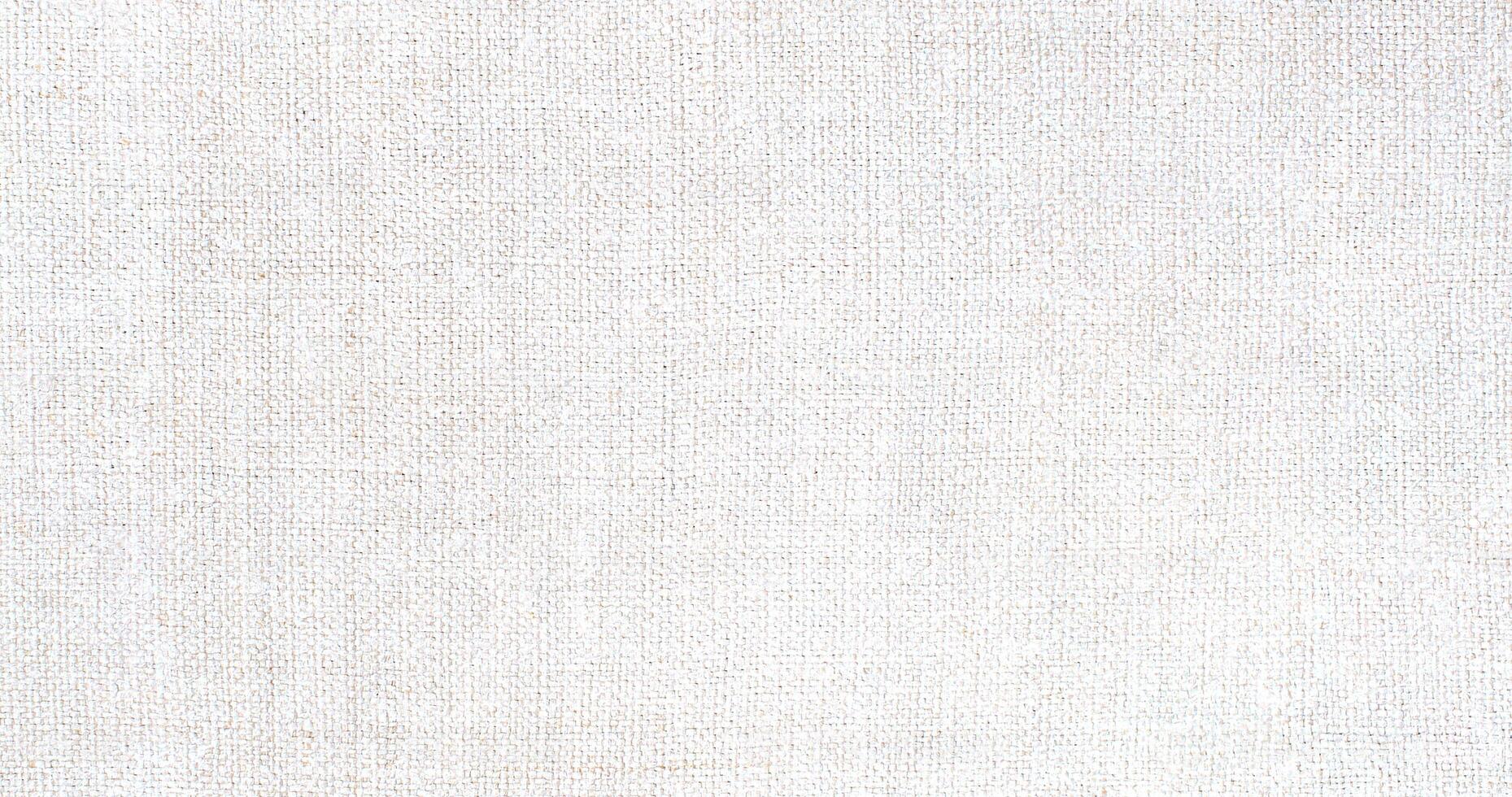Natural Linen Material Textile Canvas Fabric Texture Background Close-up Detail of Fabric Natural Color Hemp Material Pattern Design Wallpaper. Can be Used as Background or For Graphic Design photo