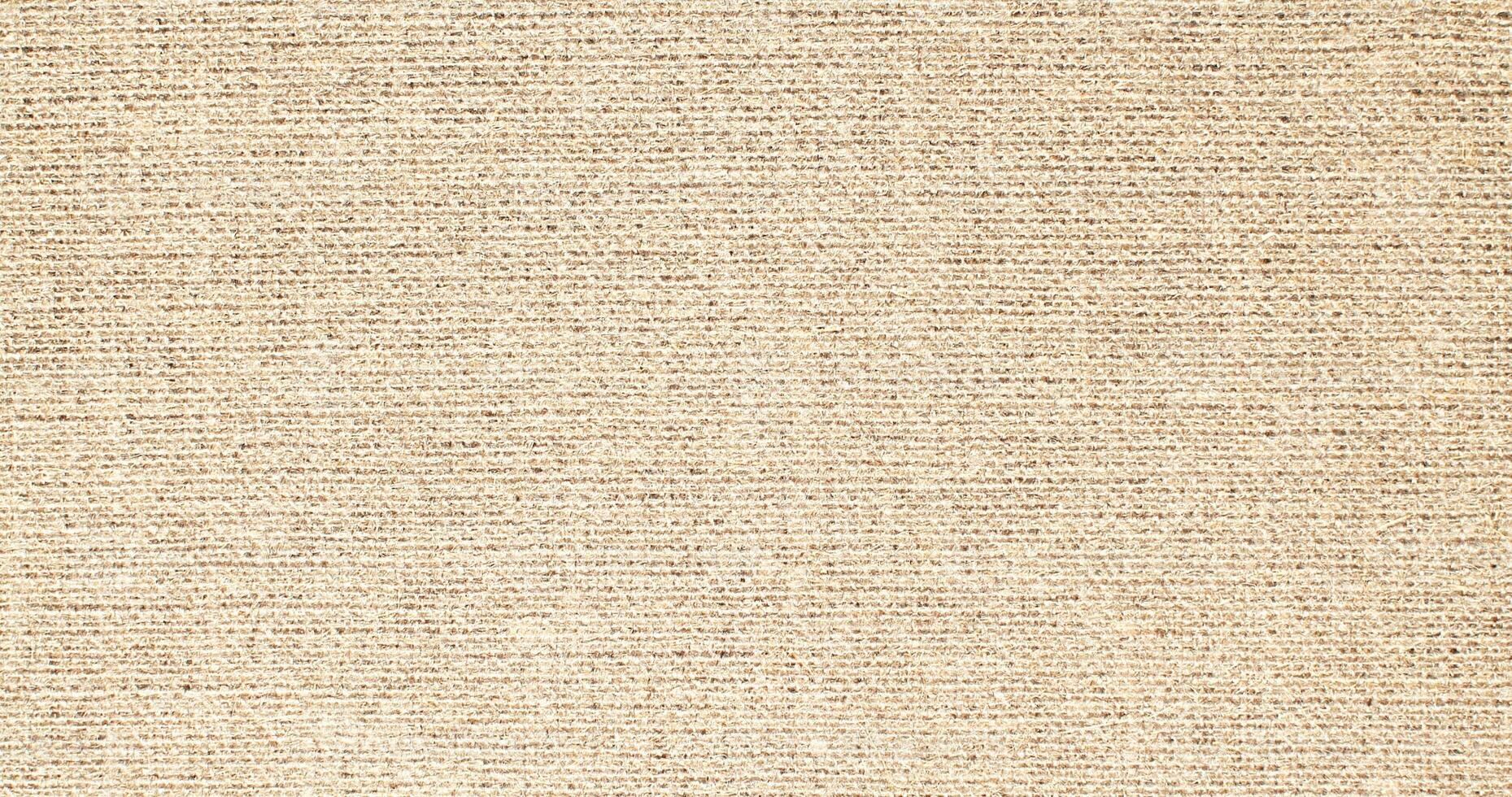 Natural Linen Material Textile Canvas Fabric Texture Background Close-up Detail of Fabric Natural Color Hemp Material Pattern Design Wallpaper. Can be Used as Background or For Graphic Design photo