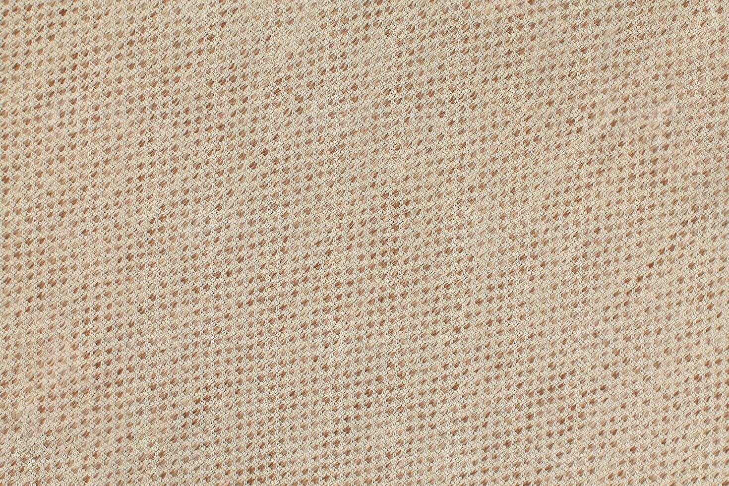 Natural Linen Material Textile Canvas Fabric Texture Background Close-up Detail of Fabric Natural Color Hemp Material Pattern Design Wallpaper. Can be Used as Background or For Graphic Design photo
