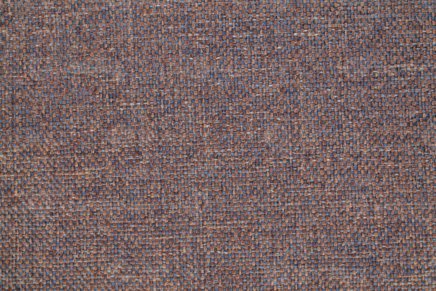 Natural Linen Material Textile Canvas Fabric Texture Background Close-up Detail of Fabric Natural Color Hemp Material Pattern Design Wallpaper. Can be Used as Background or For Graphic Design photo