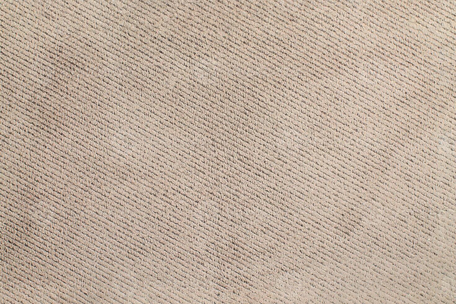 Natural Linen Material Textile Canvas Fabric Texture Background Close-up Detail of Fabric Natural Color Hemp Material Pattern Design Wallpaper. Can be Used as Background or For Graphic Design photo