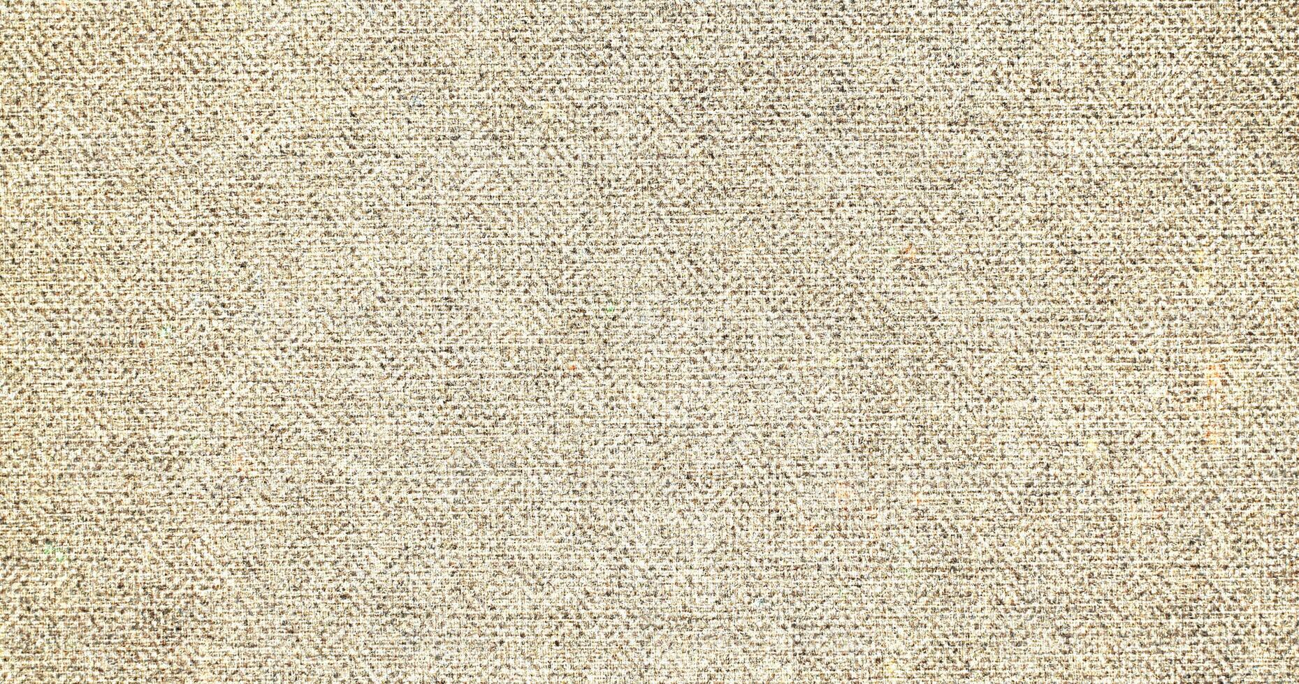 Natural Linen Material Textile Canvas Fabric Texture Background Close-up Detail of Fabric Natural Color Hemp Material Pattern Design Wallpaper. Can be Used as Background or For Graphic Design photo