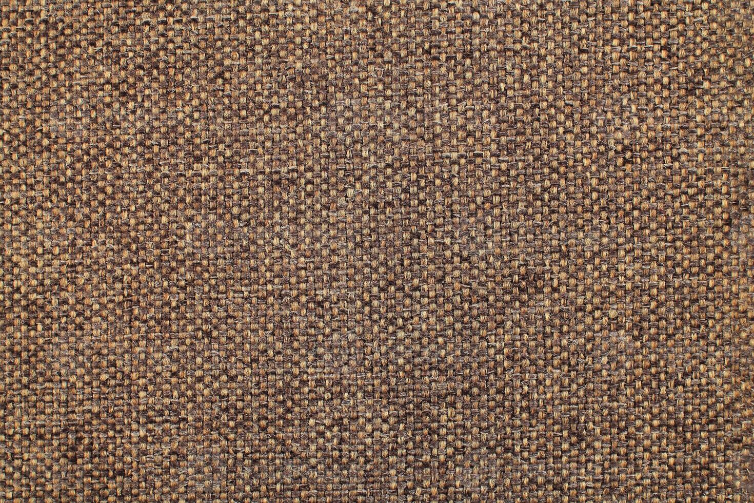 Natural Linen Material Textile Canvas Fabric Texture Background Close-up Detail of Fabric Natural Color Hemp Material Pattern Design Wallpaper. Can be Used as Background or For Graphic Design photo