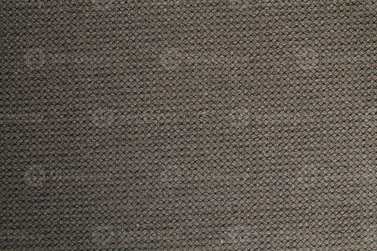Natural Linen Material Textile Canvas Fabric Texture Background Close-up Detail of Fabric Natural Color Hemp Material Pattern Design Wallpaper. Can be Used as Background or For Graphic Design photo