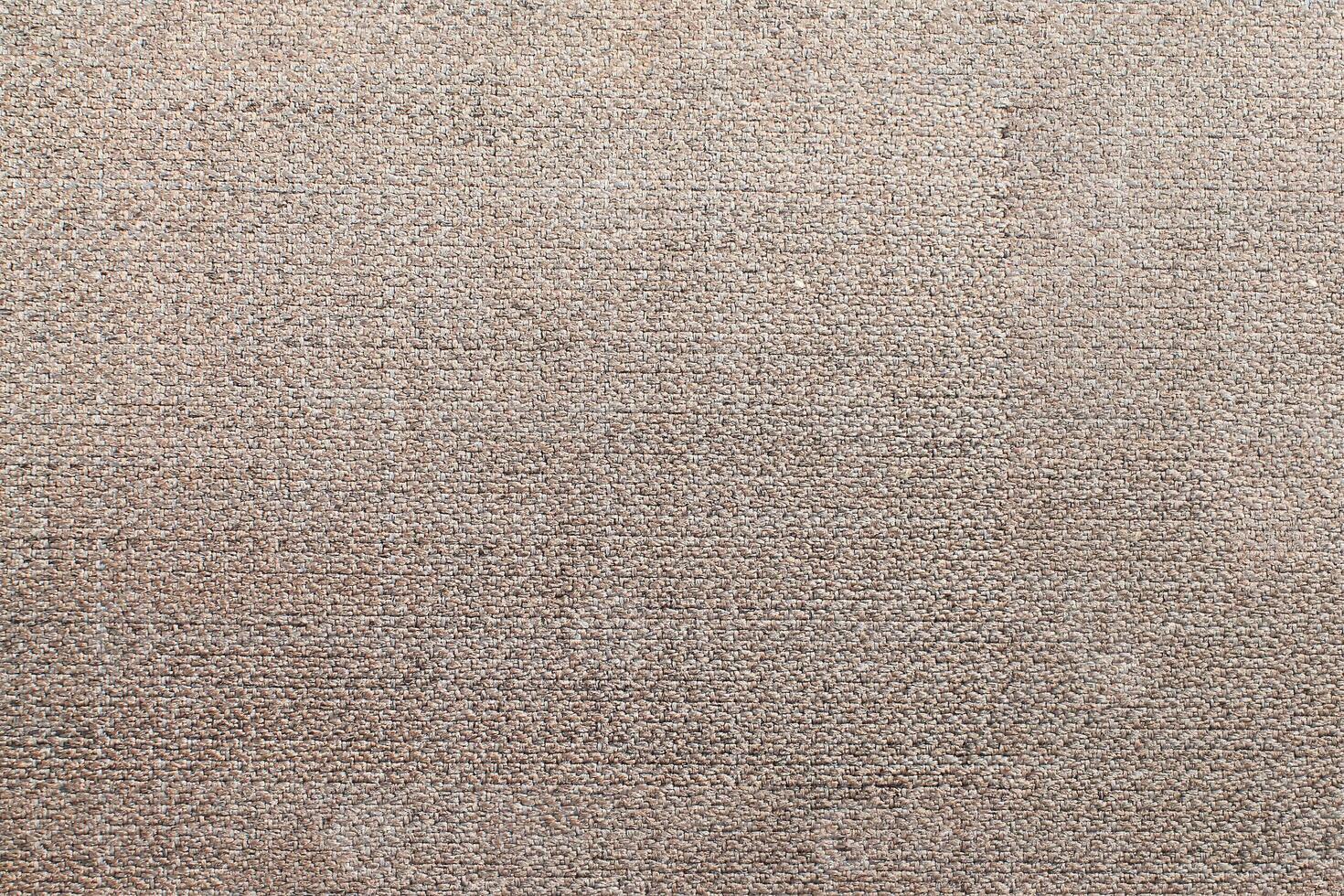 Natural Linen Material Textile Canvas Fabric Texture Background Close-up Detail of Fabric Natural Color Hemp Material Pattern Design Wallpaper. Can be Used as Background or For Graphic Design photo