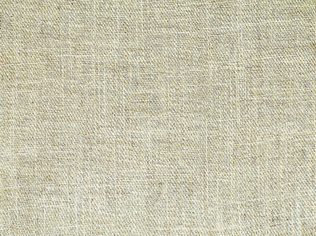 Natural Linen Material Textile Canvas Fabric Texture Background Close-up Detail of Fabric Natural Color Hemp Material Pattern Design Wallpaper. Can be Used as Background or For Graphic Design photo