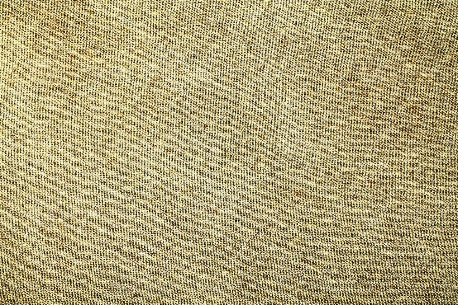 Natural Linen Material Textile Canvas Fabric Texture Background Close-up Detail of Fabric Natural Color Hemp Material Pattern Design Wallpaper. Can be Used as Background or For Graphic Design photo