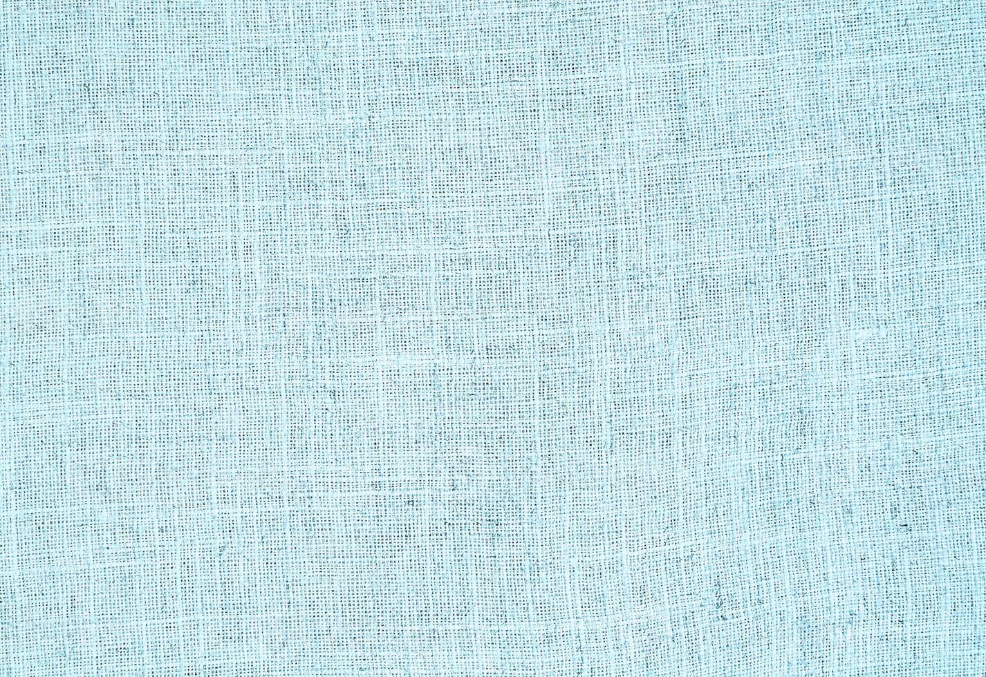 Natural Linen Material Textile Canvas Fabric Texture Background Close-up Detail of Fabric Natural Color Hemp Material Pattern Design Wallpaper. Can be Used as Background or For Graphic Design photo