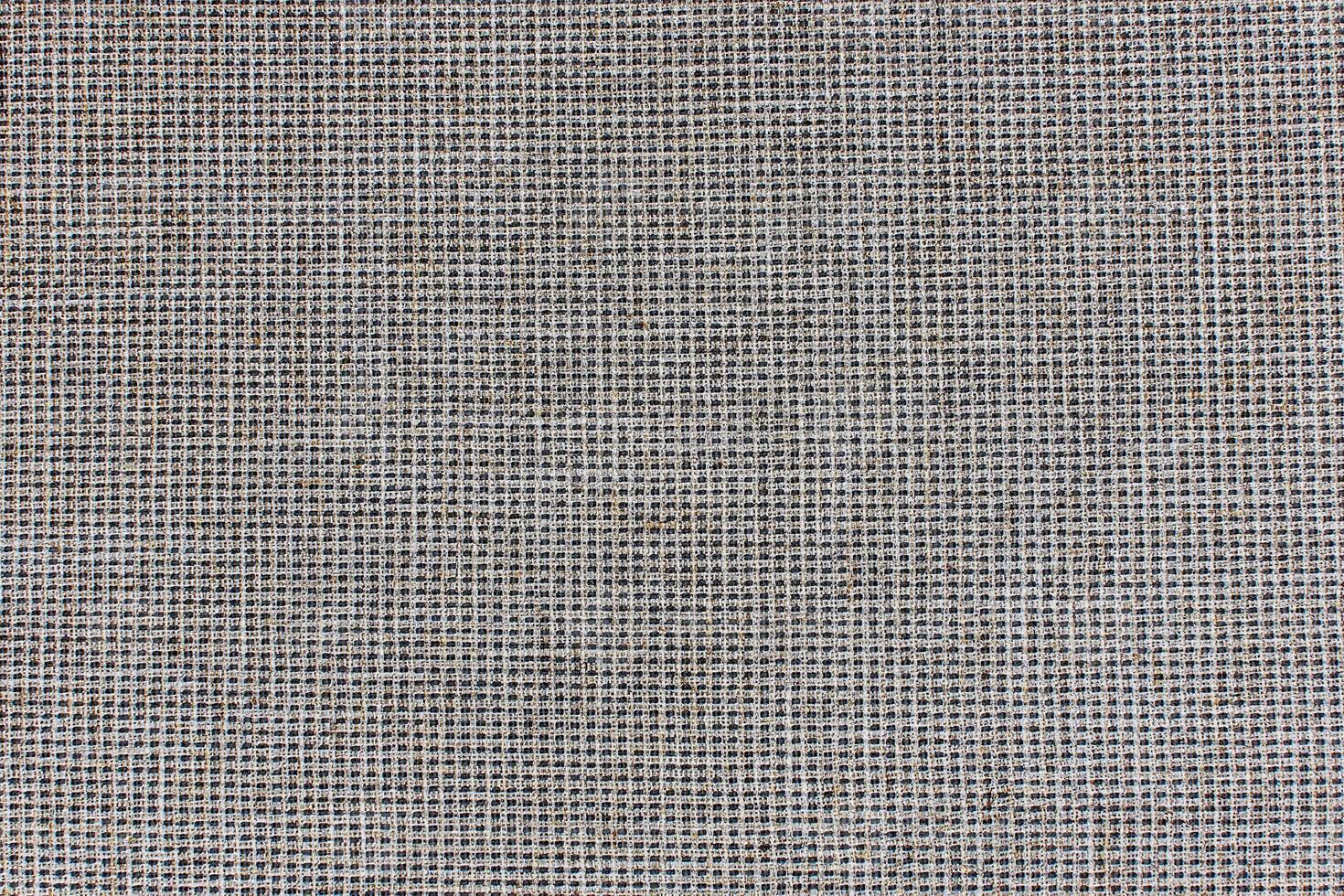 Natural Linen Material Textile Canvas Fabric Texture Background Close-up Detail of Fabric Natural Color Hemp Material Pattern Design Wallpaper. Can be Used as Background or For Graphic Design photo