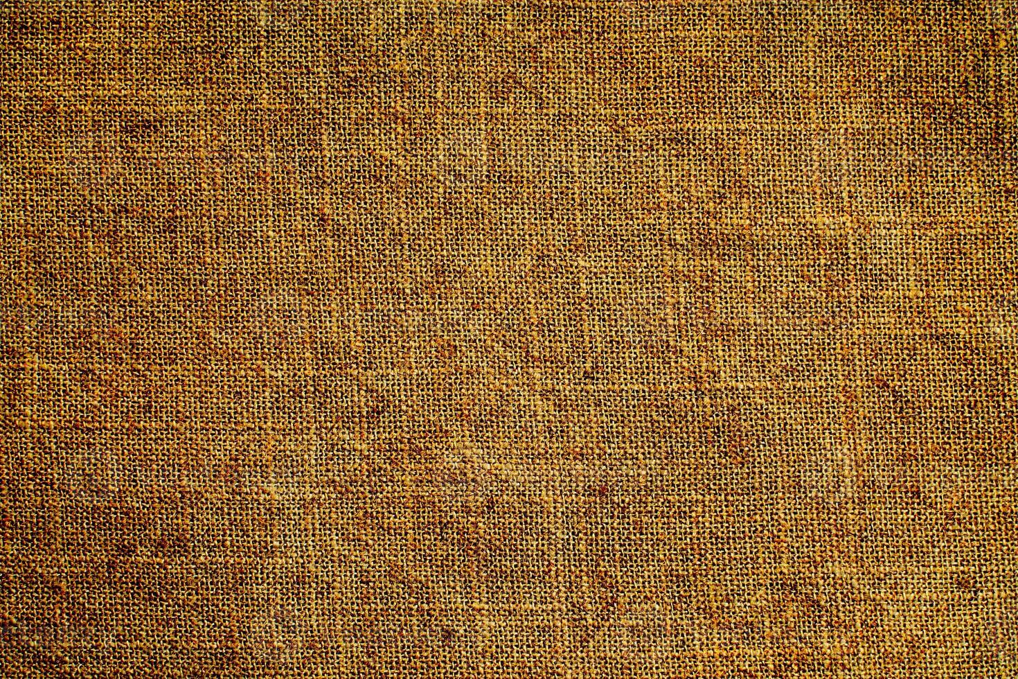 Natural Linen Material Textile Canvas Fabric Texture Background Close-up Detail of Fabric Natural Color Hemp Material Pattern Design Wallpaper. Can be Used as Background or For Graphic Design photo