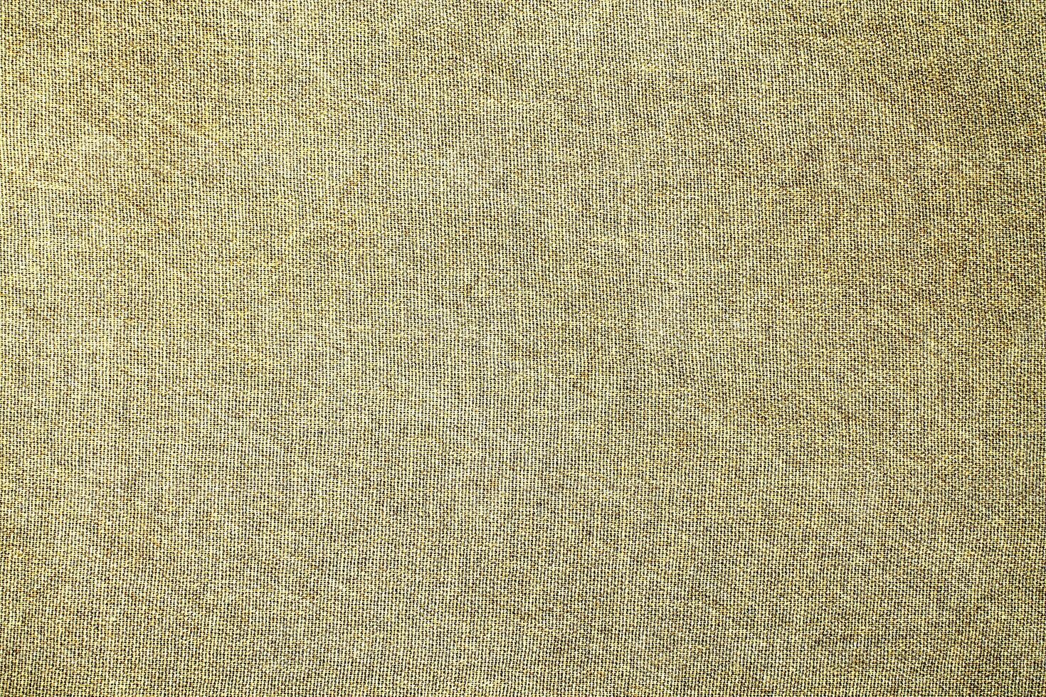 Natural Linen Material Textile Canvas Fabric Texture Background Close-up Detail of Fabric Natural Color Hemp Material Pattern Design Wallpaper. Can be Used as Background or For Graphic Design photo