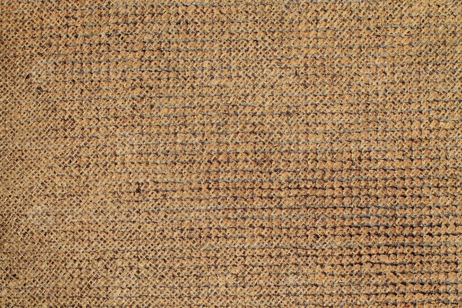 Natural Linen Material Textile Canvas Fabric Texture Background Close-up Detail of Fabric Natural Color Hemp Material Pattern Design Wallpaper. Can be Used as Background or For Graphic Design photo