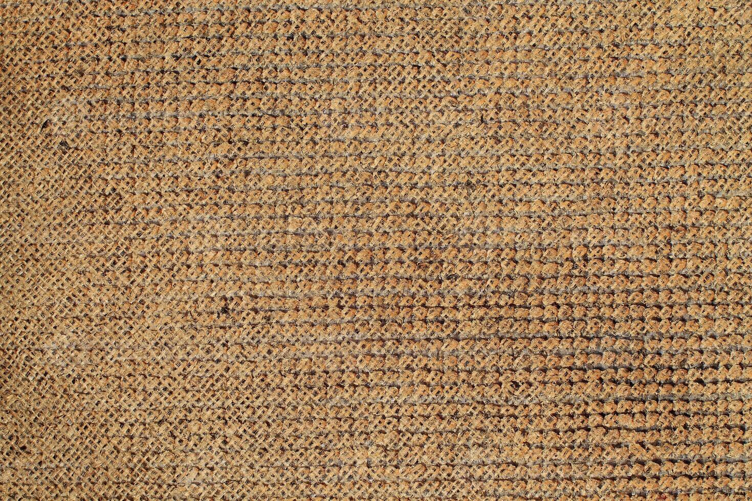 Natural Linen Material Textile Canvas Fabric Texture Background Close-up Detail of Fabric Natural Color Hemp Material Pattern Design Wallpaper. Can be Used as Background or For Graphic Design photo