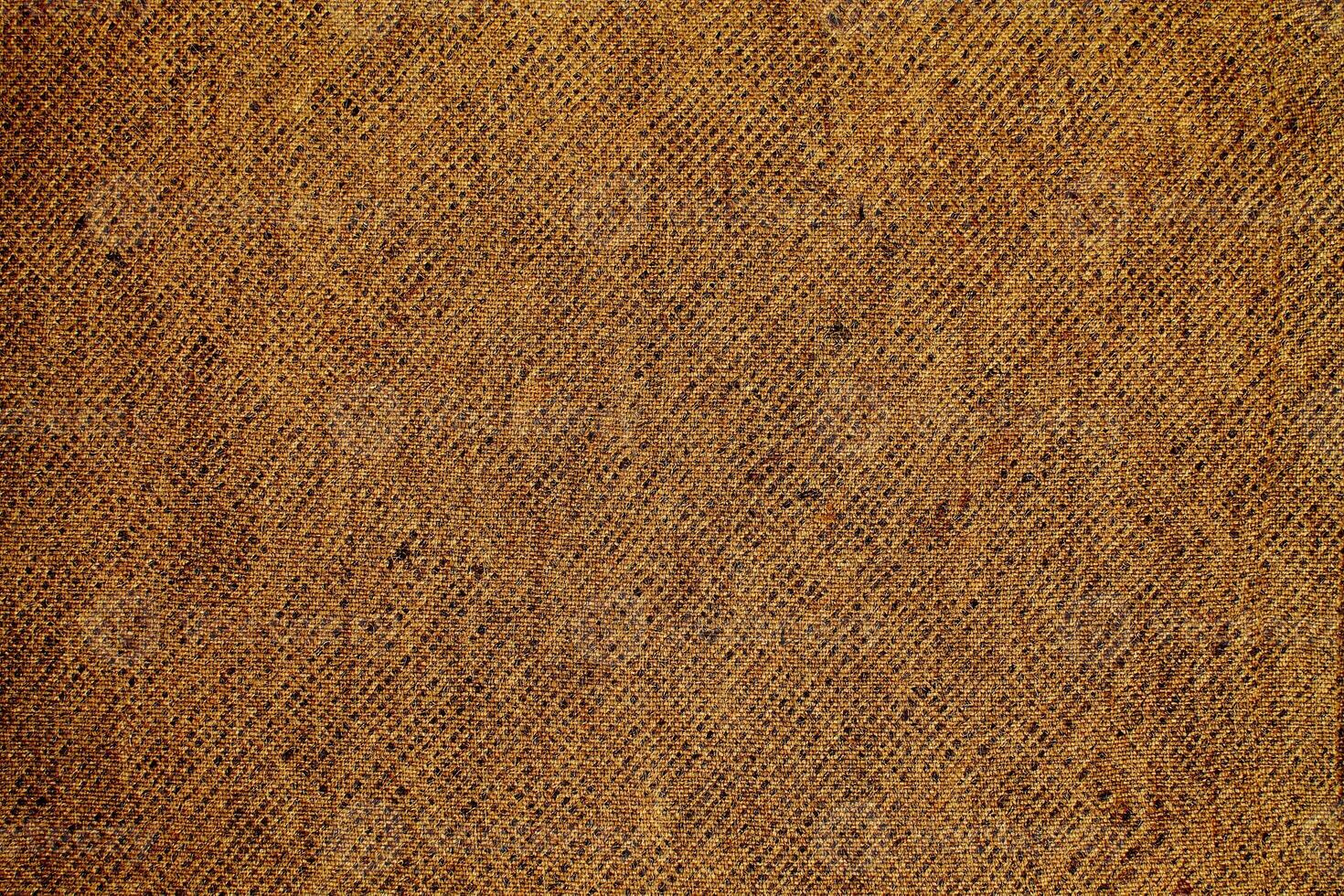 Natural Linen Material Textile Canvas Fabric Texture Background Close-up Detail of Fabric Natural Color Hemp Material Pattern Design Wallpaper. Can be Used as Background or For Graphic Design photo