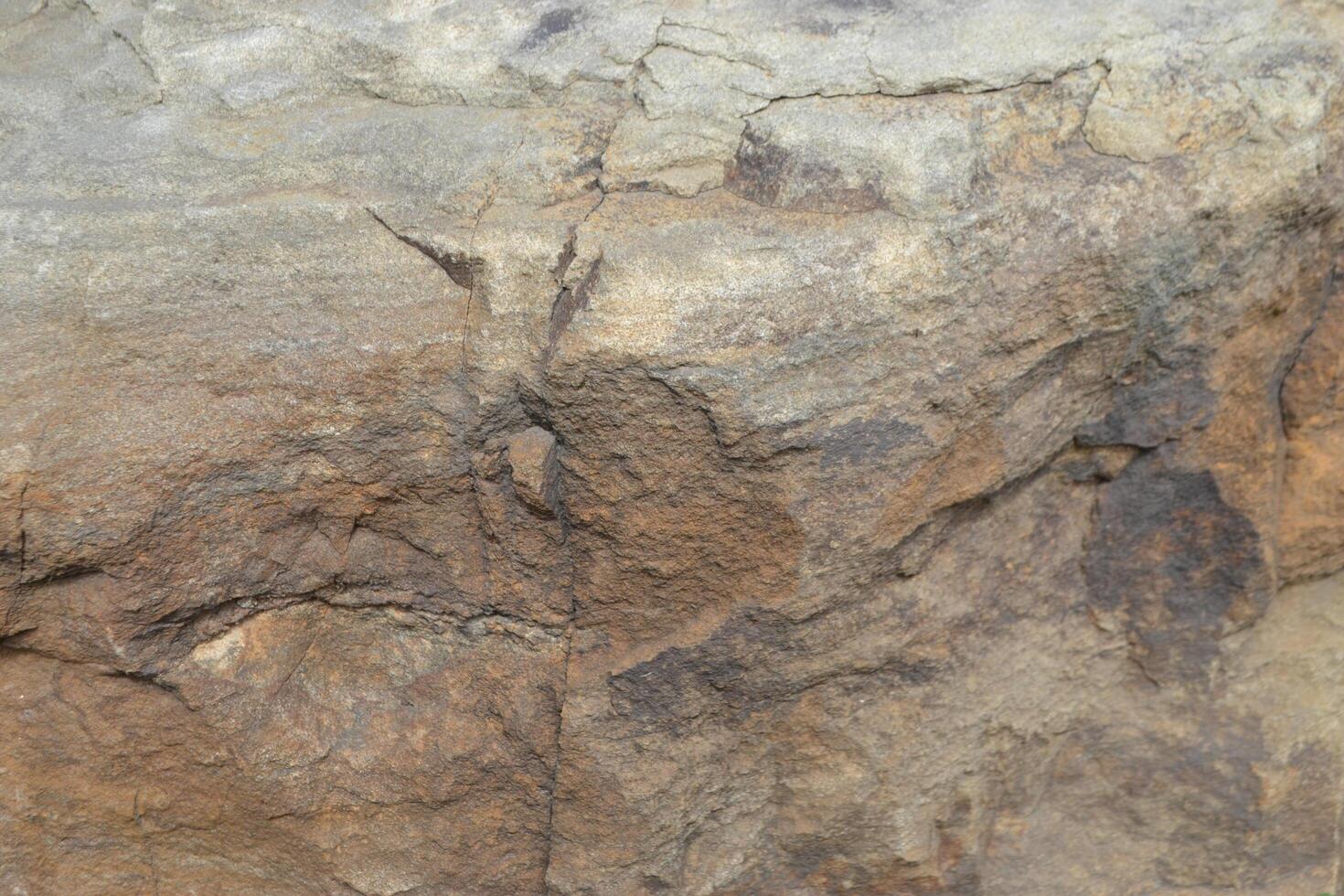 Abstract Natural Rock Stone Granite Grunge Rusty Metal Texture Design Background Natural Color Stone Material Granite Design Wallpaper. Close-up Detail of Natural Stone photo