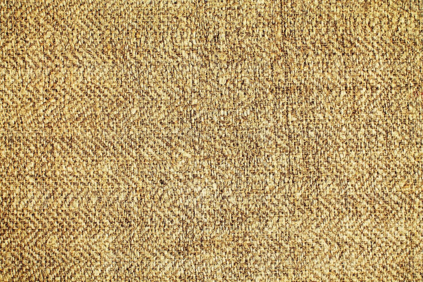 Natural Linen Material Textile Canvas Fabric Texture Background Close-up Detail of Fabric Natural Color Hemp Material Pattern Design Wallpaper. Can be Used as Background or For Graphic Design photo