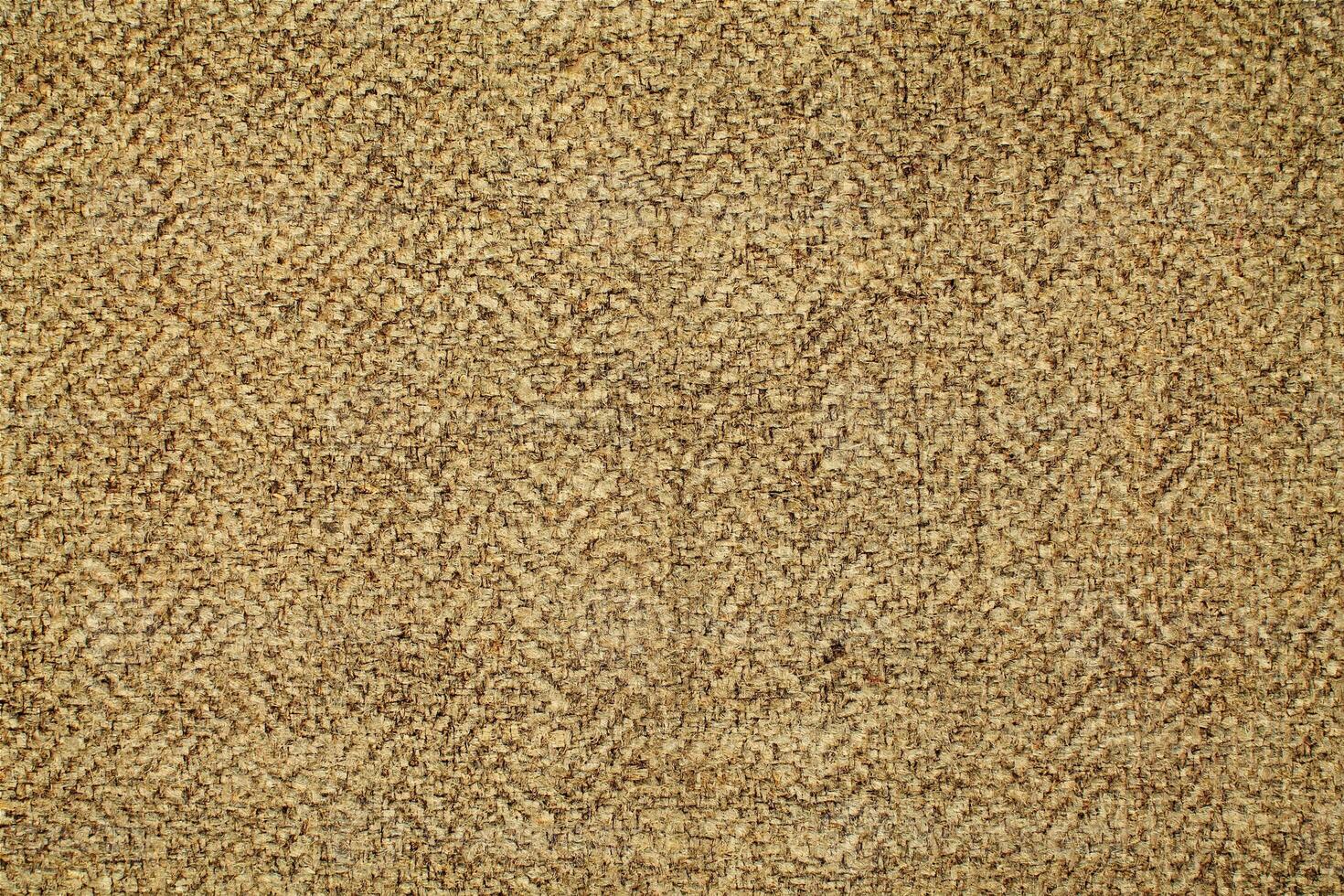 Natural Linen Material Textile Canvas Fabric Texture Background Close-up Detail of Fabric Natural Color Hemp Material Pattern Design Wallpaper. Can be Used as Background or For Graphic Design photo