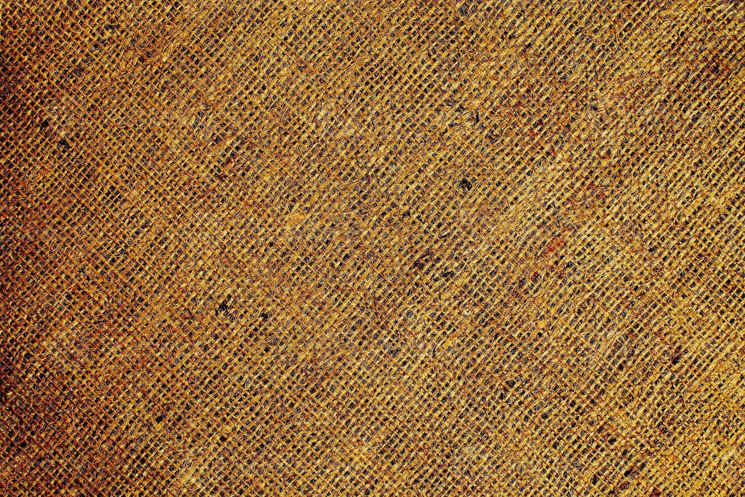 Natural Linen Material Textile Canvas Fabric Texture Background Close-up Detail of Fabric Natural Color Hemp Material Pattern Design Wallpaper. Can be Used as Background or For Graphic Design photo