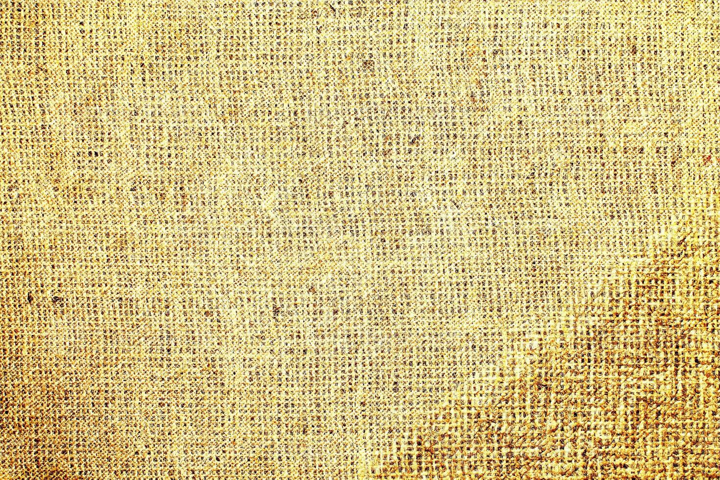 Natural Linen Material Textile Canvas Fabric Texture Background Close-up Detail of Fabric Natural Color Hemp Material Pattern Design Wallpaper. Can be Used as Background or For Graphic Design photo