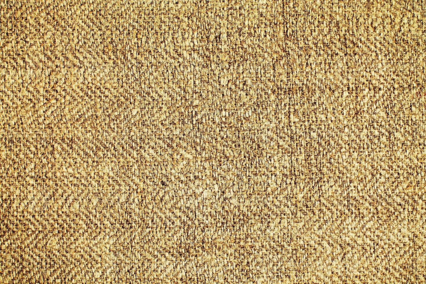 Natural Linen Material Textile Canvas Fabric Texture Background Close-up Detail of Fabric Natural Color Hemp Material Pattern Design Wallpaper. Can be Used as Background or For Graphic Design photo