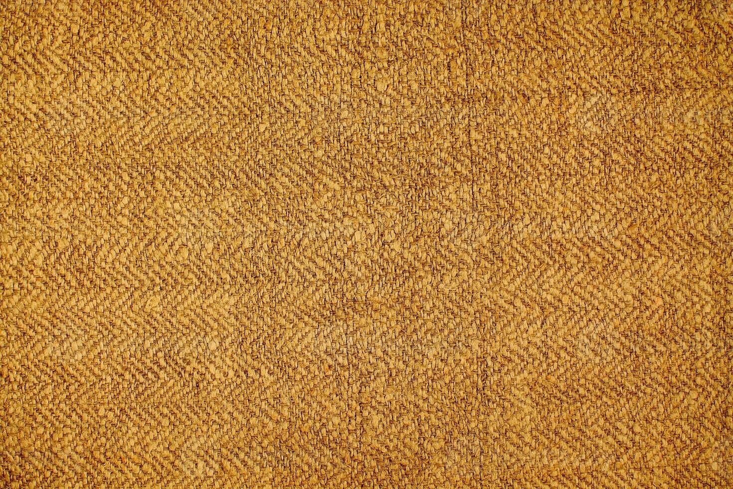 Natural Linen Material Textile Canvas Fabric Texture Background Close-up Detail of Fabric Natural Color Hemp Material Pattern Design Wallpaper. Can be Used as Background or For Graphic Design photo