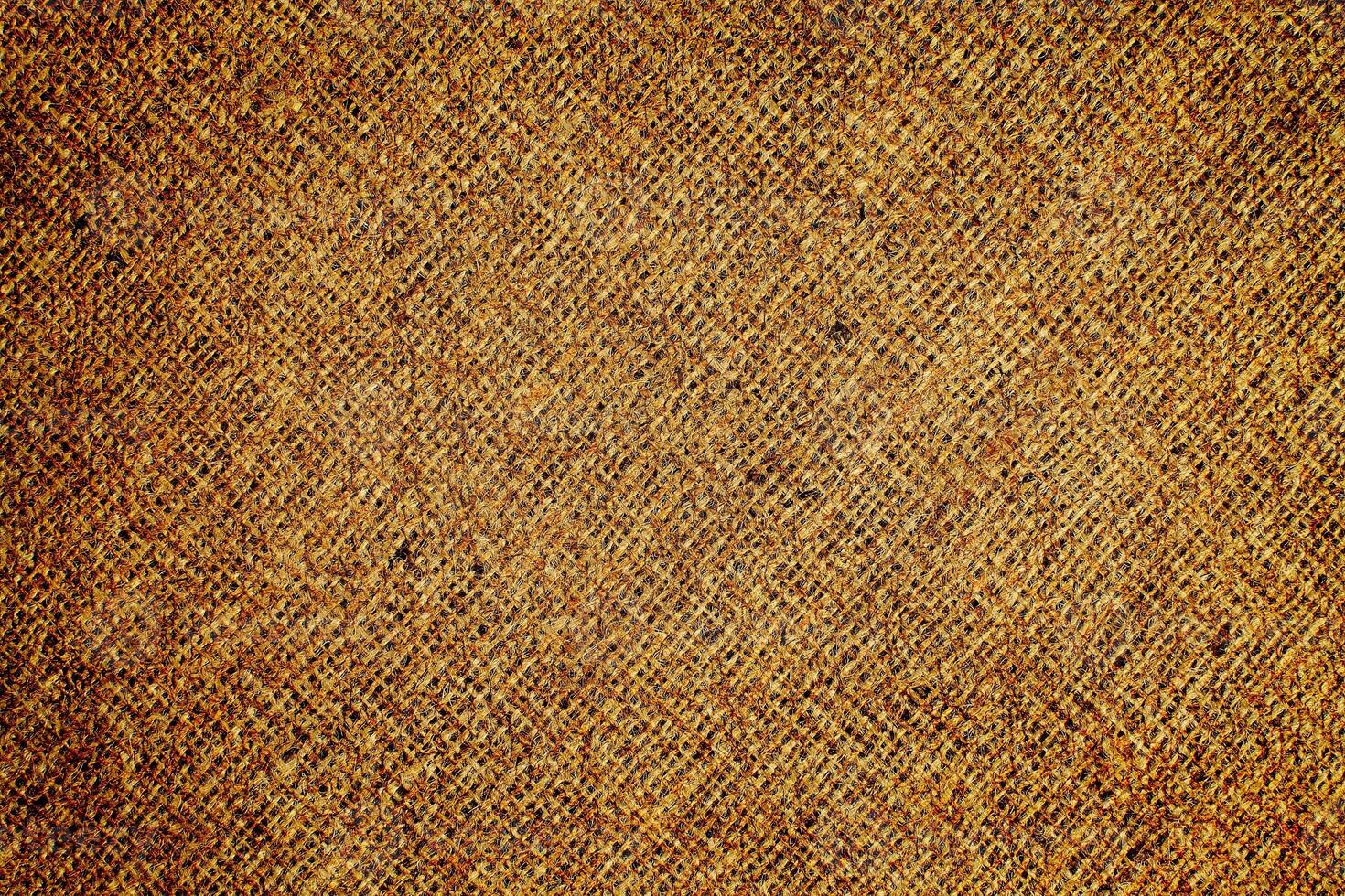 Natural Linen Material Textile Canvas Fabric Texture Background Close-up Detail of Fabric Natural Color Hemp Material Pattern Design Wallpaper. Can be Used as Background or For Graphic Design photo