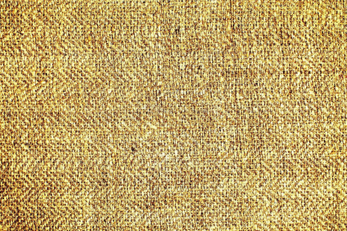 Natural Linen Material Textile Canvas Fabric Texture Background Close-up Detail of Fabric Natural Color Hemp Material Pattern Design Wallpaper. Can be Used as Background or For Graphic Design photo