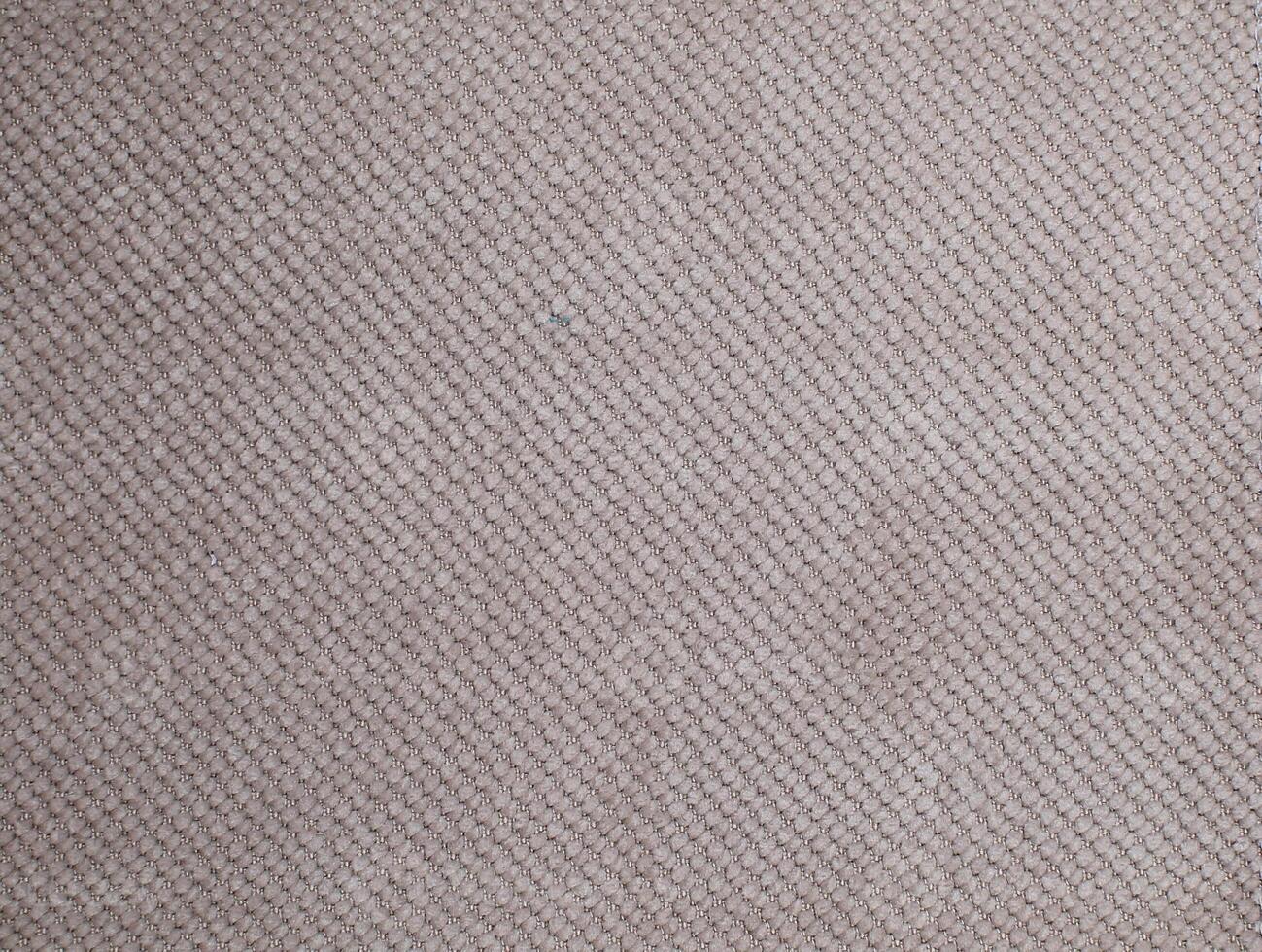Natural Linen Material Textile Canvas Fabric Texture Background Close-up Detail of Fabric Natural Color Hemp Material Pattern Design Wallpaper. Can be Used as Background or For Graphic Design photo