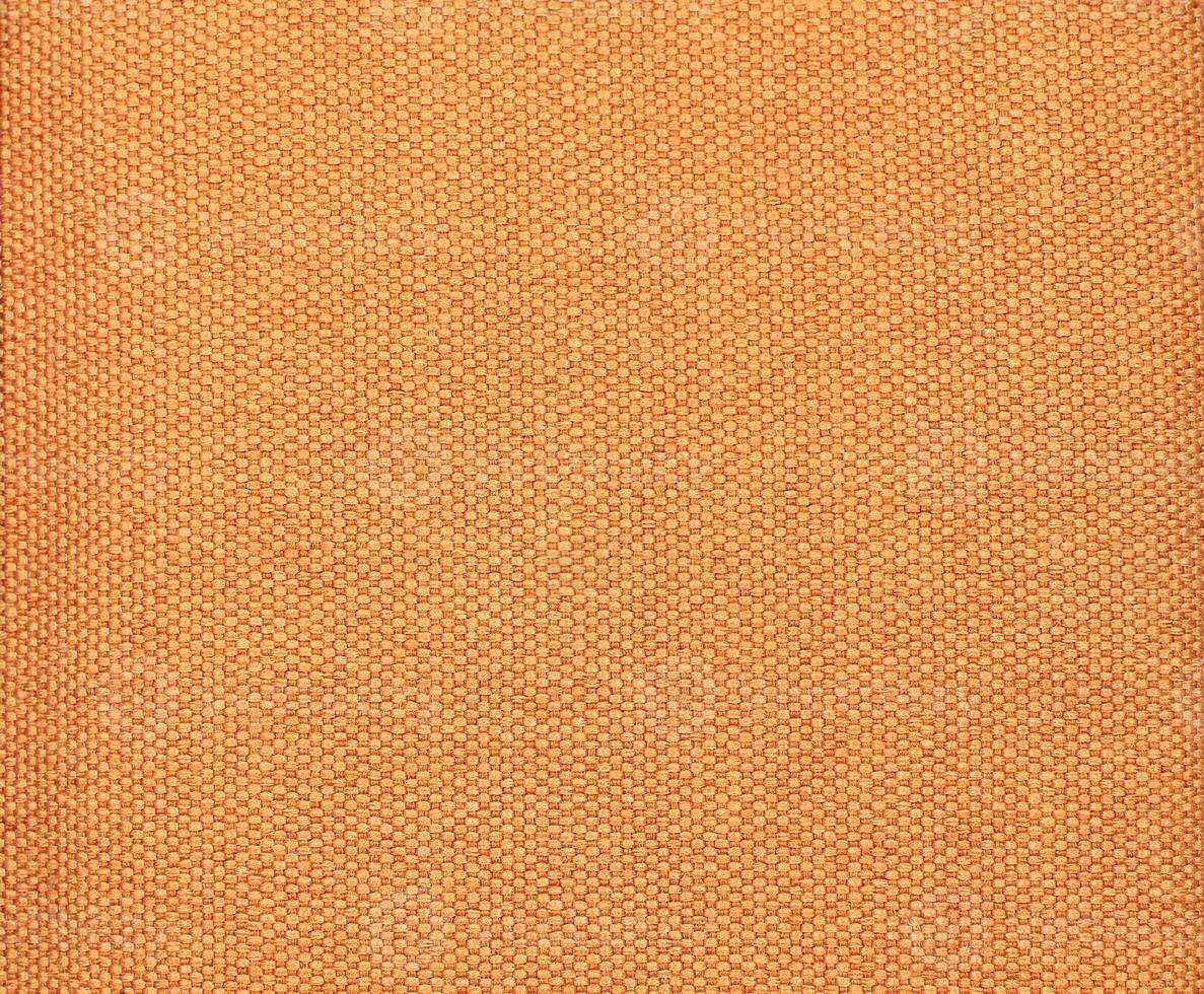 Natural Linen Material Textile Canvas Fabric Texture Background Close-up Detail of Fabric Natural Color Hemp Material Pattern Design Wallpaper. Can be Used as Background or For Graphic Design photo