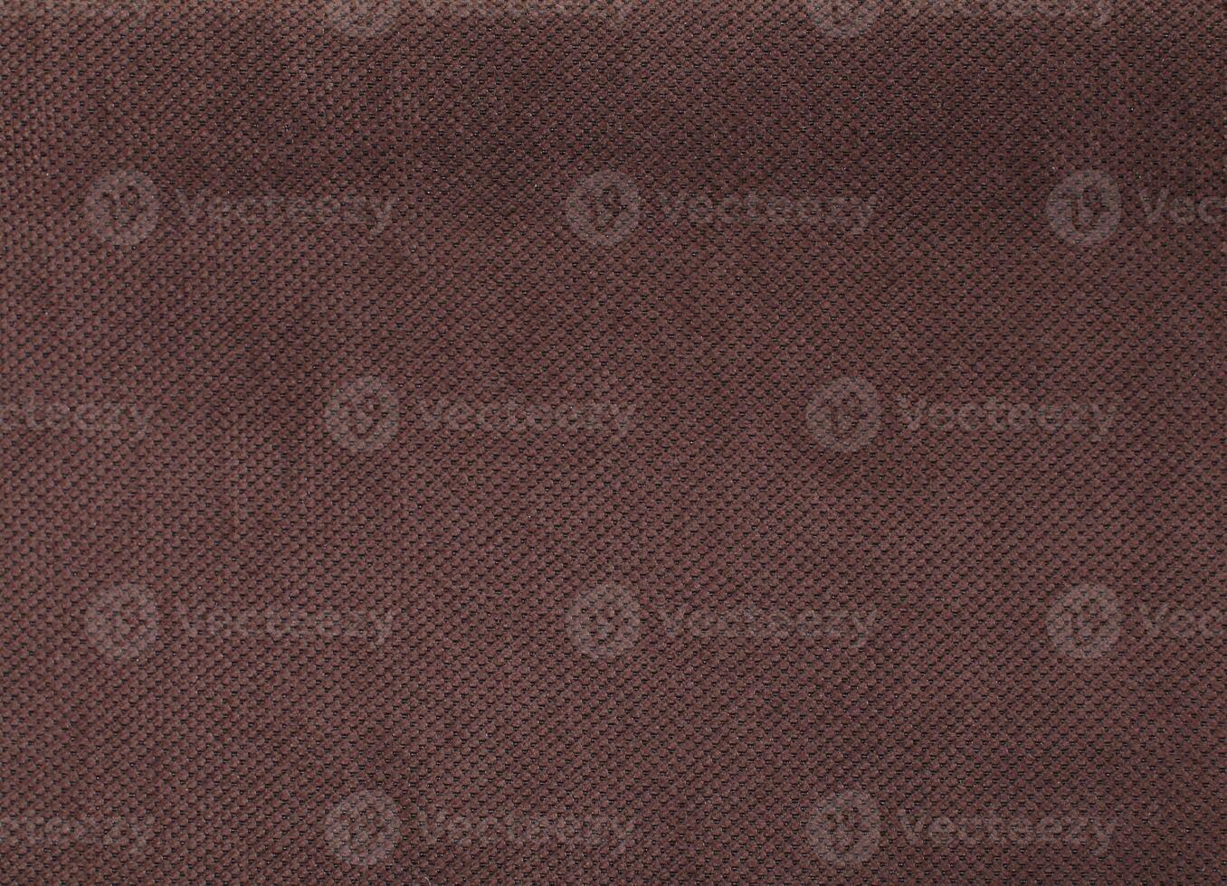 Natural Linen Material Textile Canvas Fabric Texture Background Close-up Detail of Fabric Natural Color Hemp Material Pattern Design Wallpaper. Can be Used as Background or For Graphic Design photo