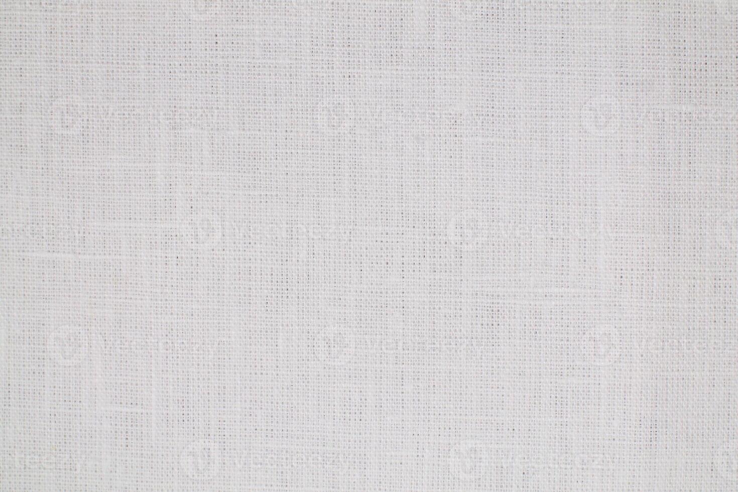 Natural Linen Material Textile Canvas Fabric Texture Background Close-up Detail of Fabric Natural Color Hemp Material Pattern Design Wallpaper. Can be Used as Background or For Graphic Design photo