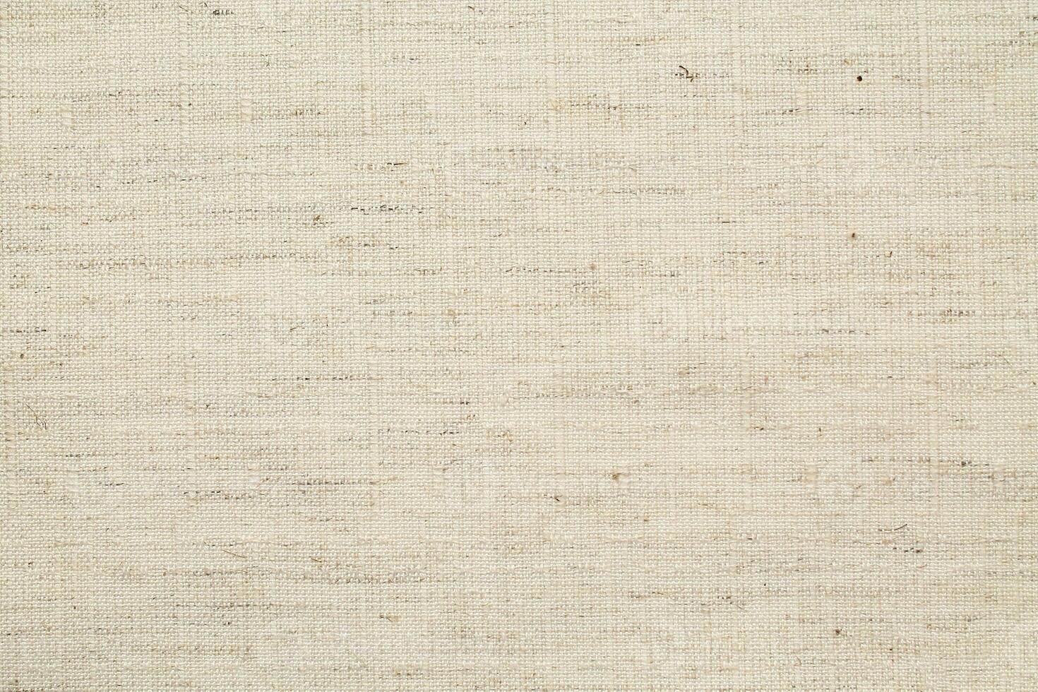 Natural Linen Material Textile Canvas Fabric Texture Background Close-up Detail of Fabric Natural Color Hemp Material Pattern Design Wallpaper. Can be Used as Background or For Graphic Design photo