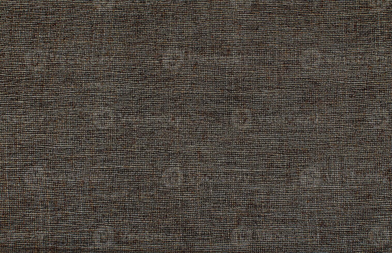 Natural Linen Material Textile Canvas Fabric Texture Background Close-up Detail of Fabric Natural Color Hemp Material Pattern Design Wallpaper. Can be Used as Background or For Graphic Design photo