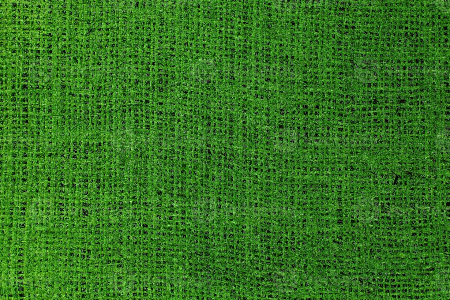 Natural Linen Material Textile Canvas Fabric Texture Background Close-up Detail of Fabric Natural Color Hemp Material Pattern Design Wallpaper. Can be Used as Background or For Graphic Design photo