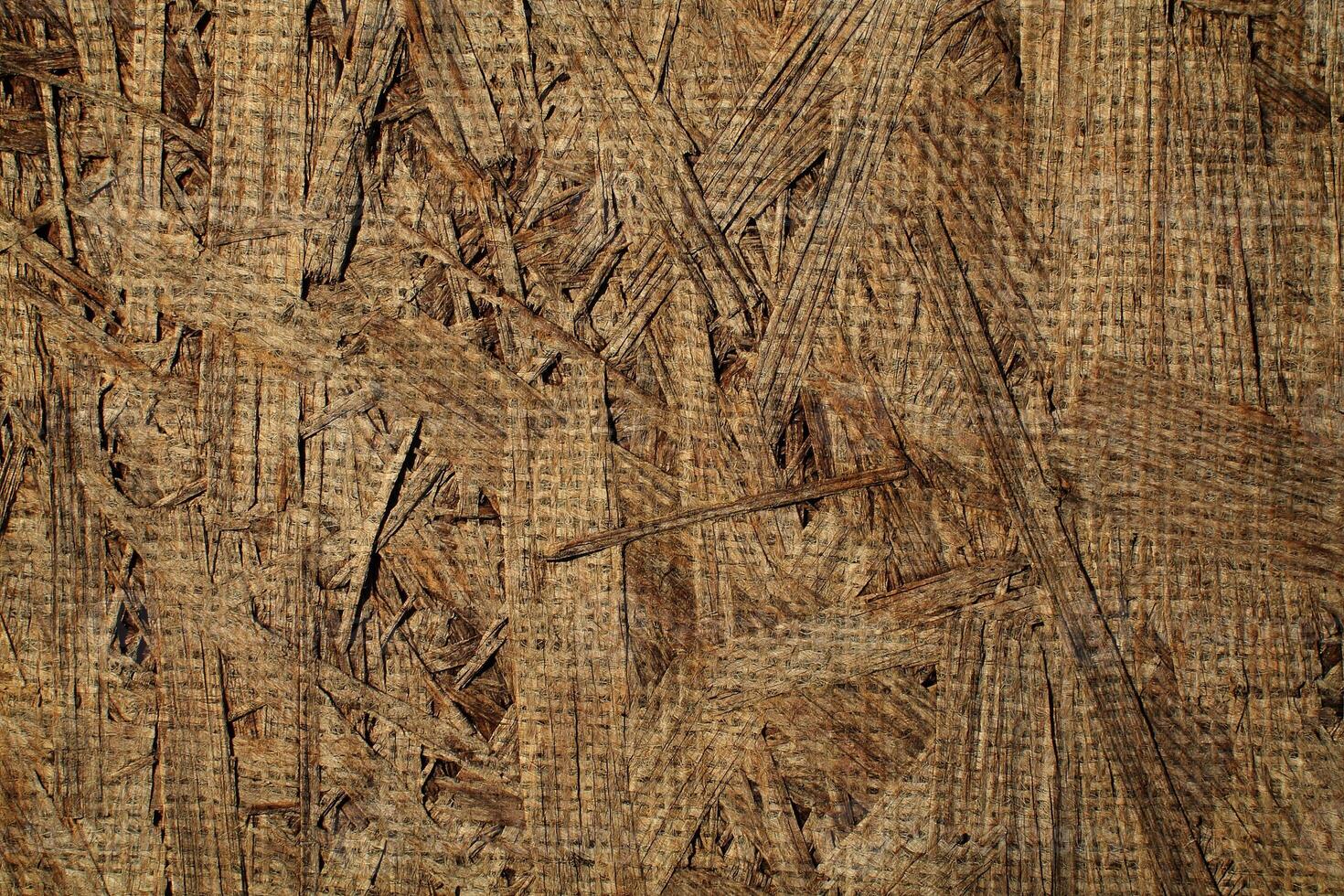 Natural Linen Material Textile Canvas Fabric Texture Background Close-up Detail of Fabric Natural Color Hemp Material Pattern Design Wallpaper. Can be Used as Background or For Graphic Design photo