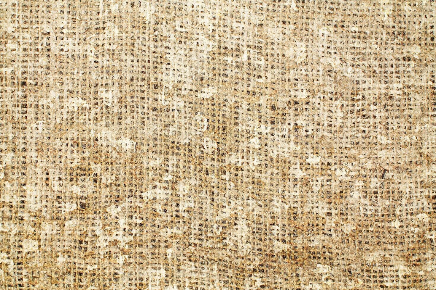 Natural Linen Material Textile Canvas Fabric Texture Background Close-up Detail of Fabric Natural Color Hemp Material Pattern Design Wallpaper. Can be Used as Background or For Graphic Design photo