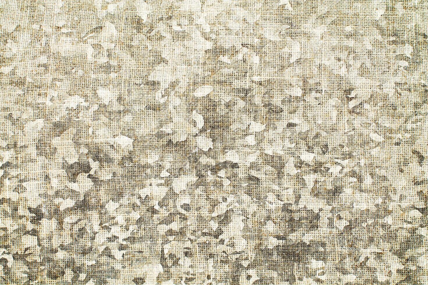 Natural Linen Material Textile Canvas Fabric Texture Background Close-up Detail of Fabric Natural Color Hemp Material Pattern Design Wallpaper. Can be Used as Background or For Graphic Design photo