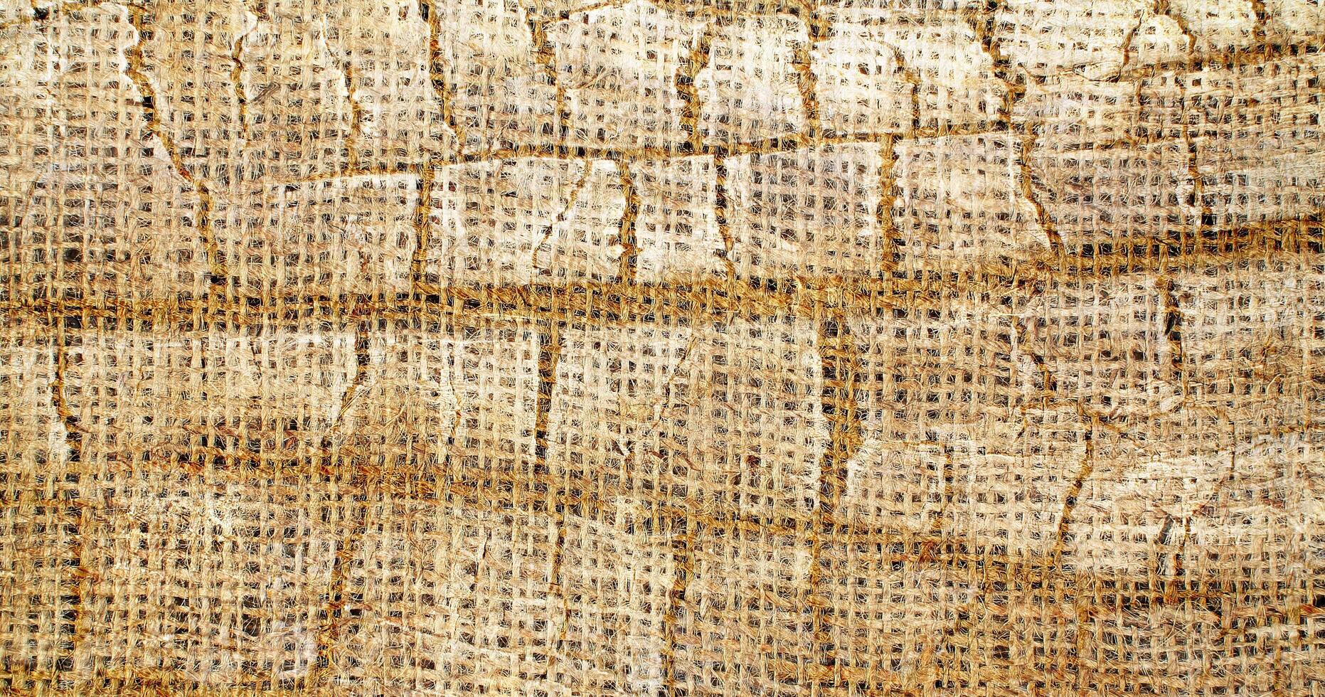 Natural Linen Material Textile Canvas Fabric Texture Background Close-up Detail of Fabric Natural Color Hemp Material Pattern Design Wallpaper. Can be Used as Background or For Graphic Design photo