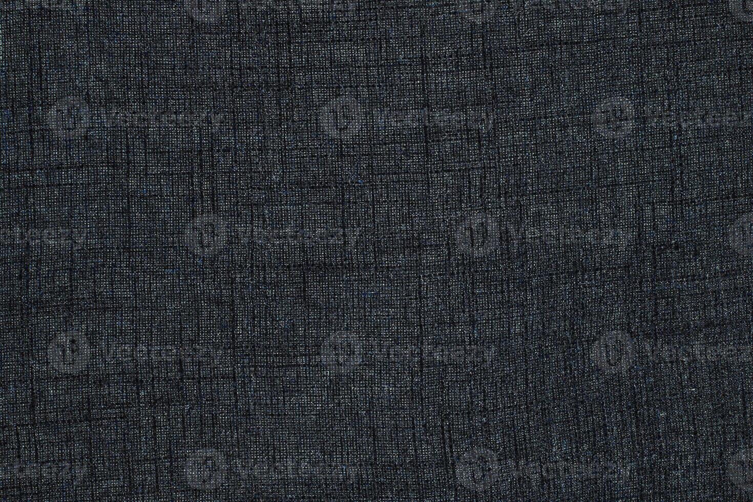 Natural Linen Material Textile Canvas Fabric Texture Background Close-up Detail of Fabric Natural Color Hemp Material Pattern Design Wallpaper. Can be Used as Background or For Graphic Design photo