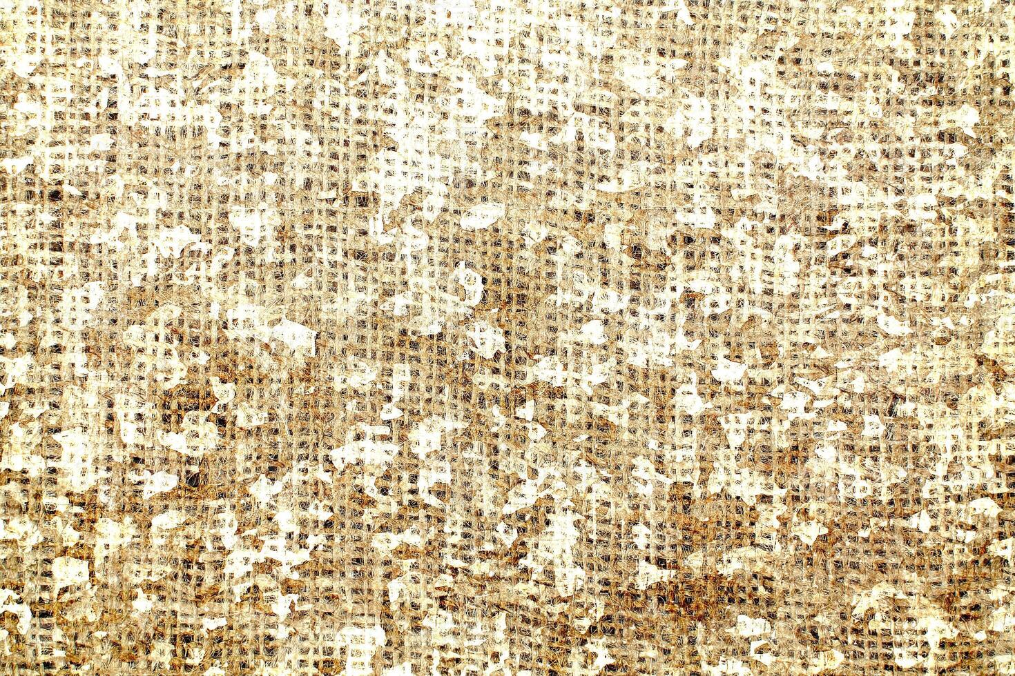 Natural Linen Material Textile Canvas Fabric Texture Background Close-up Detail of Fabric Natural Color Hemp Material Pattern Design Wallpaper. Can be Used as Background or For Graphic Design photo