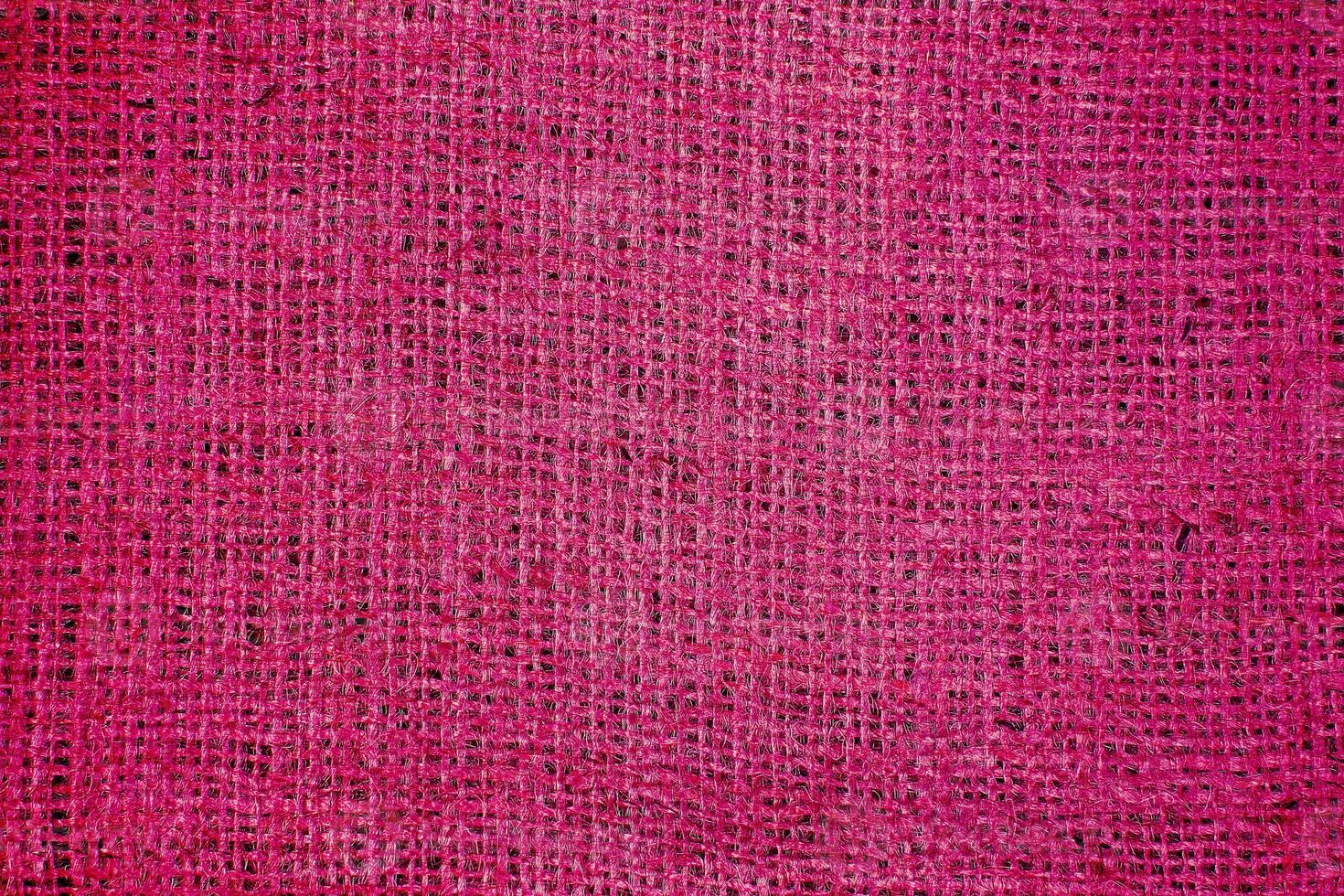 Natural Linen Material Textile Canvas Fabric Texture Background Close-up Detail of Fabric Natural Color Hemp Material Pattern Design Wallpaper. Can be Used as Background or For Graphic Design photo