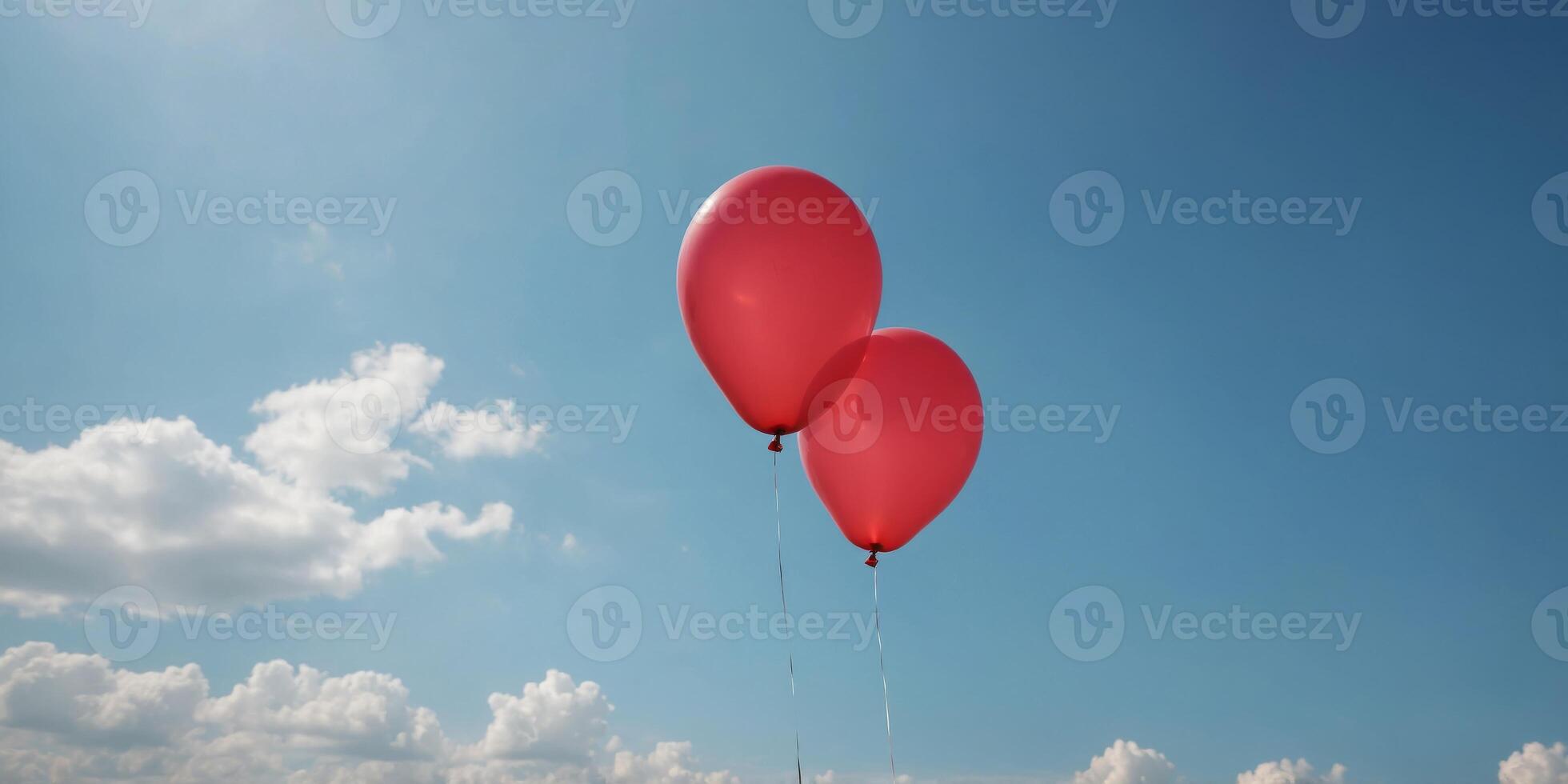 Single red balloon floating in clear blue sky. photo