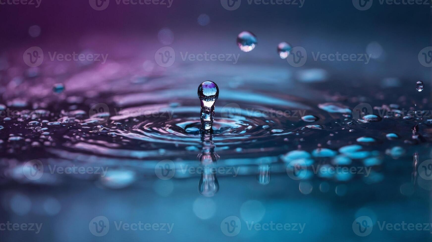 water dripping water with purple and blue colors. photo